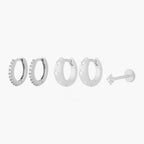 This Twinkle Starter Set has 2 chunky twinkle huggies, 2 mini pave huggies, and one micro twinkle flatback stud. These styles are all silver toned with clear CZ stone accents.