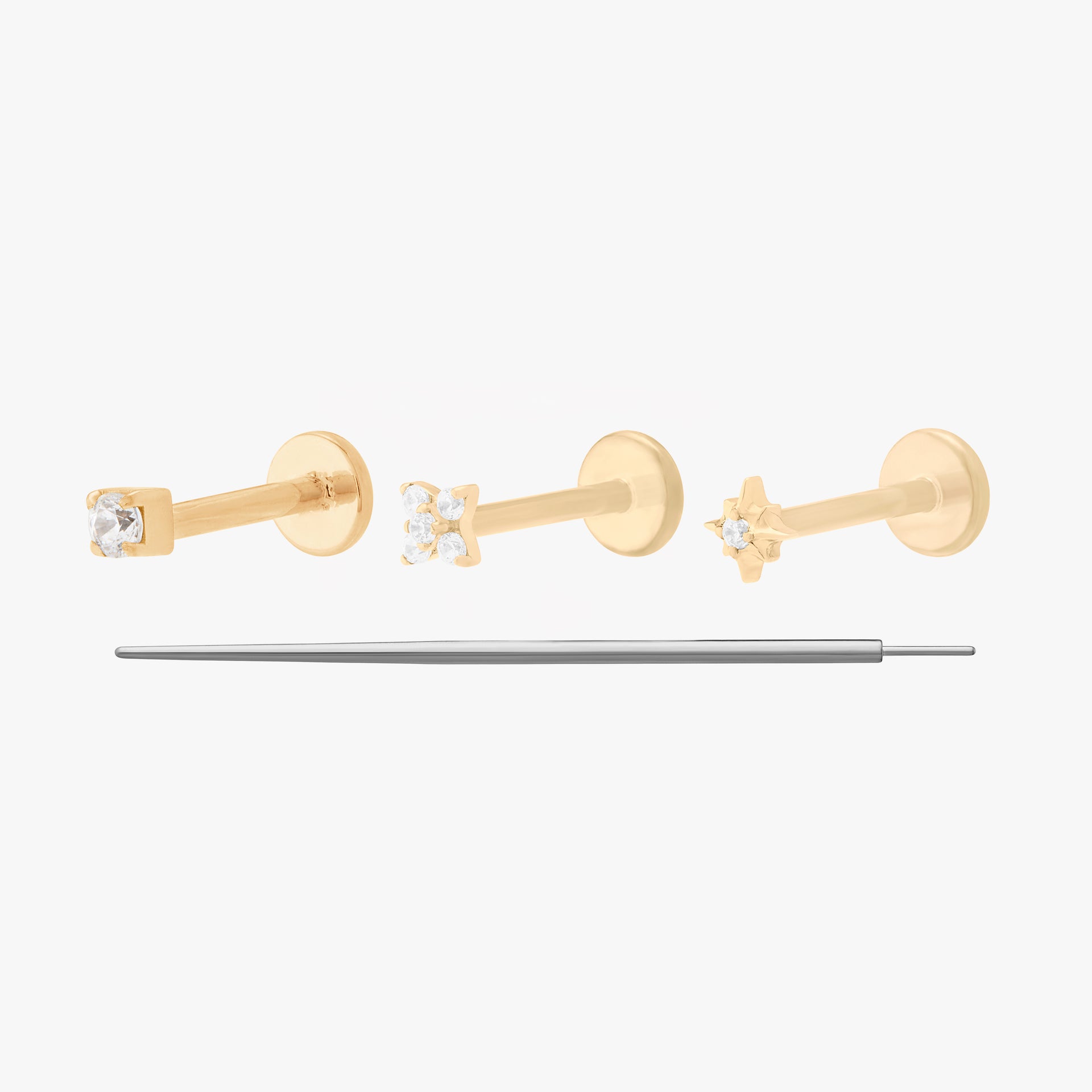 This Micro Starter Set includes a micro cz flatback stud, a pave x flatback stud, and a micro twinkle cz flatback stud. All of these styles are gold-toned and include clear cz stone accents.