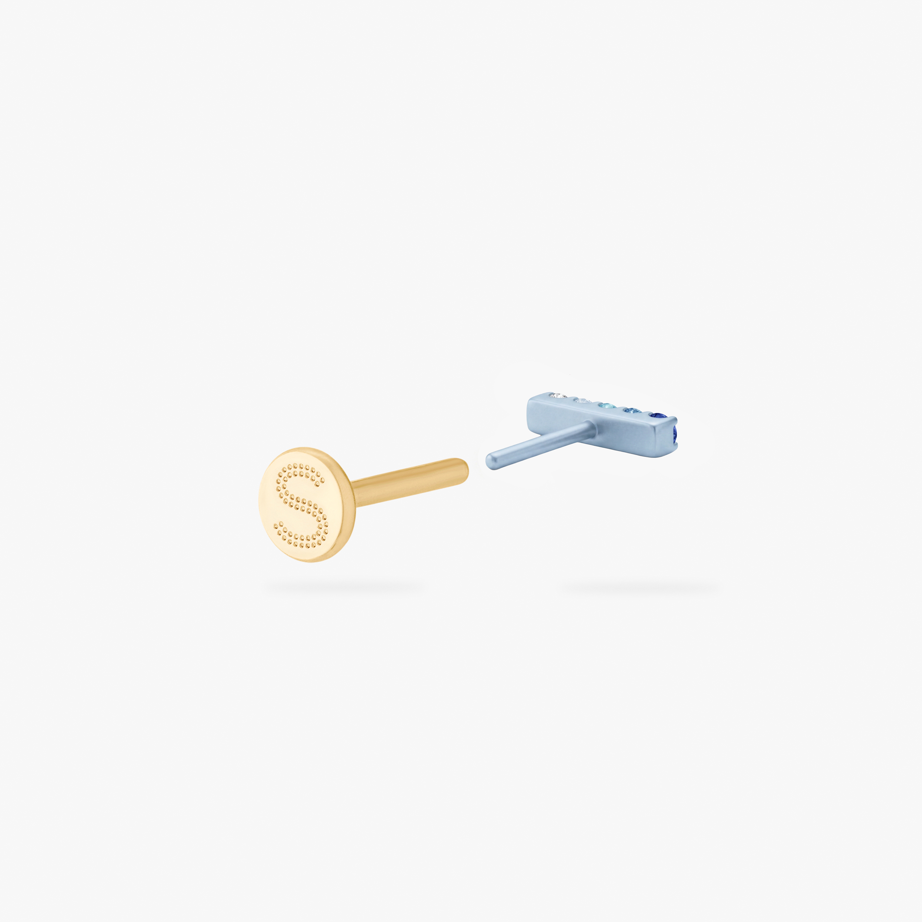 This is an image of an anodized blue flatback stud with a gradient of 5 blue CZ stones creating a pave bar. The flatback post for this earring is gold toned. - Alternative view 4
