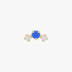 this image shows the front view of a gold plated micro cluster flatback with two clear and one blue cz stones