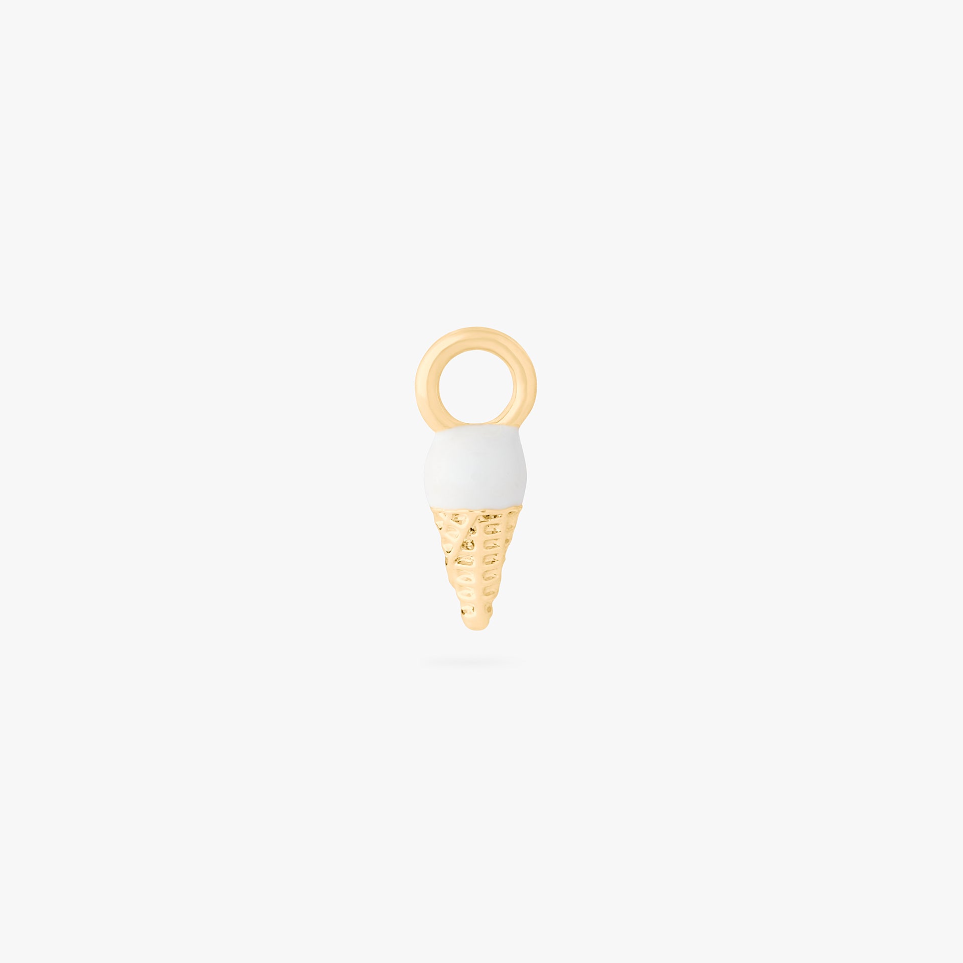 This is an image of a gold earring charm in the shape of an ice cream cone with white and tan enameling. - Alternative view 1