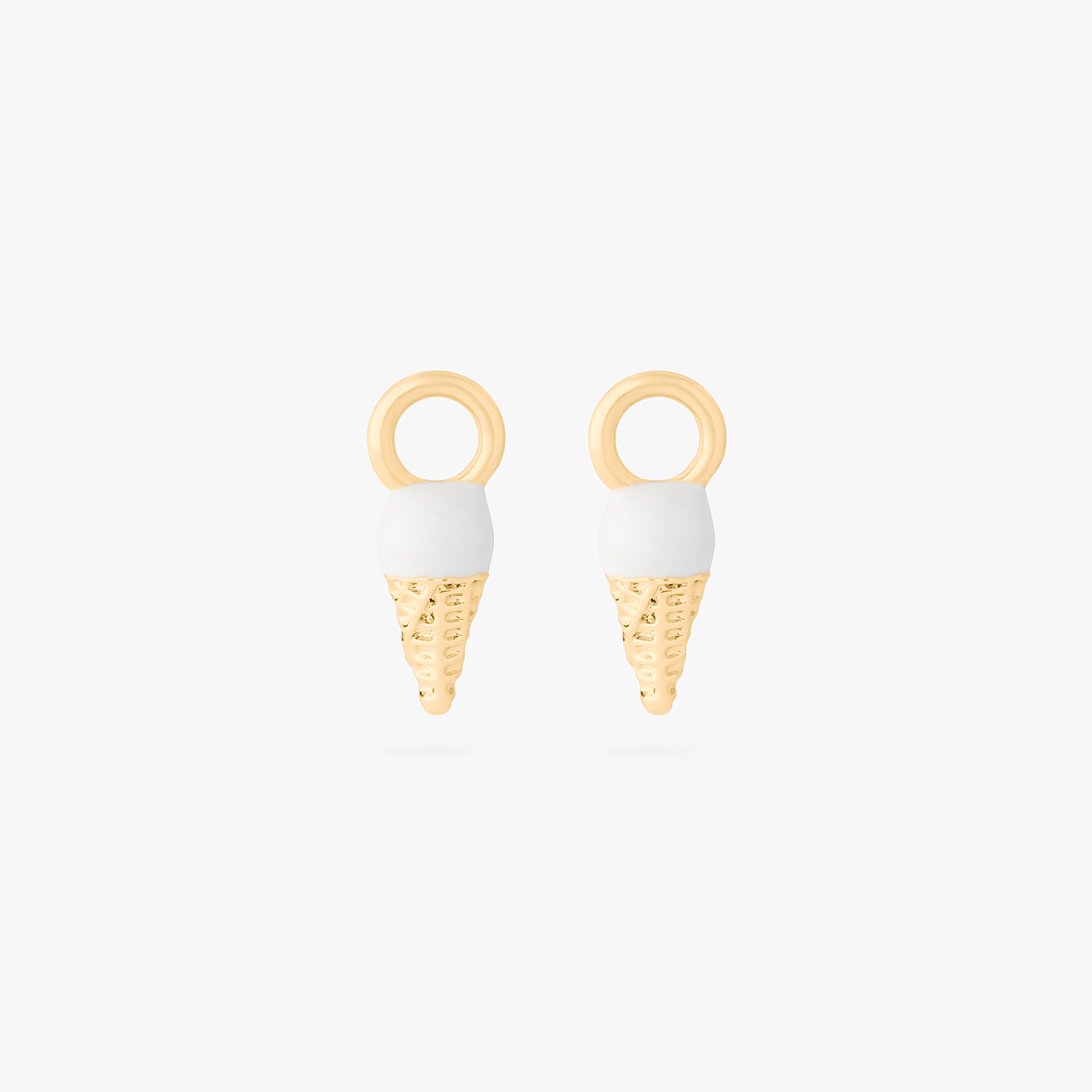 This is an image of a pair of gold earring charms in the shape of ice cream cones with white and tan enameling. - Alternative view 5
