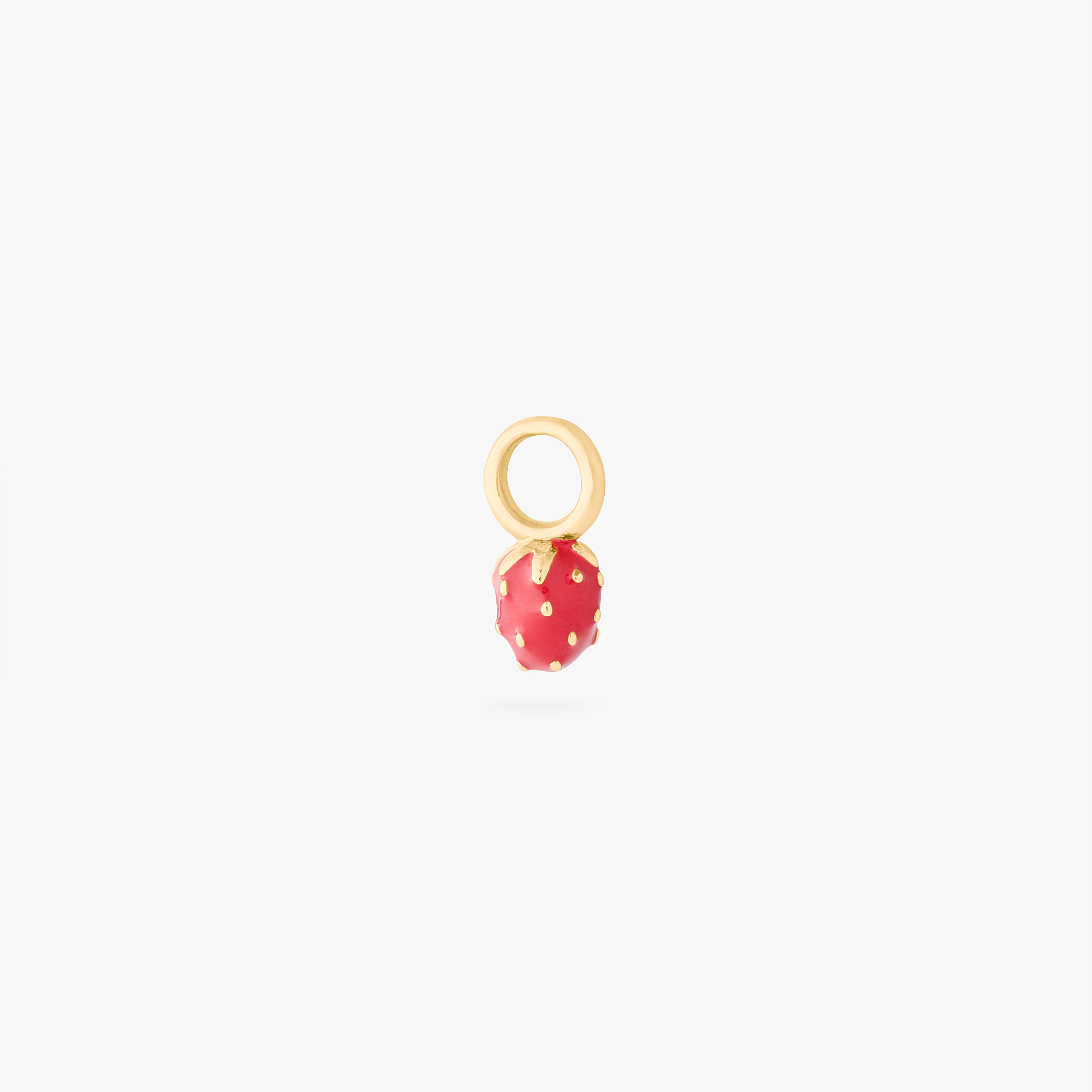 This is an image of a gold earring charm in the shape of a strawberry with red enameling. color:null|gold/red