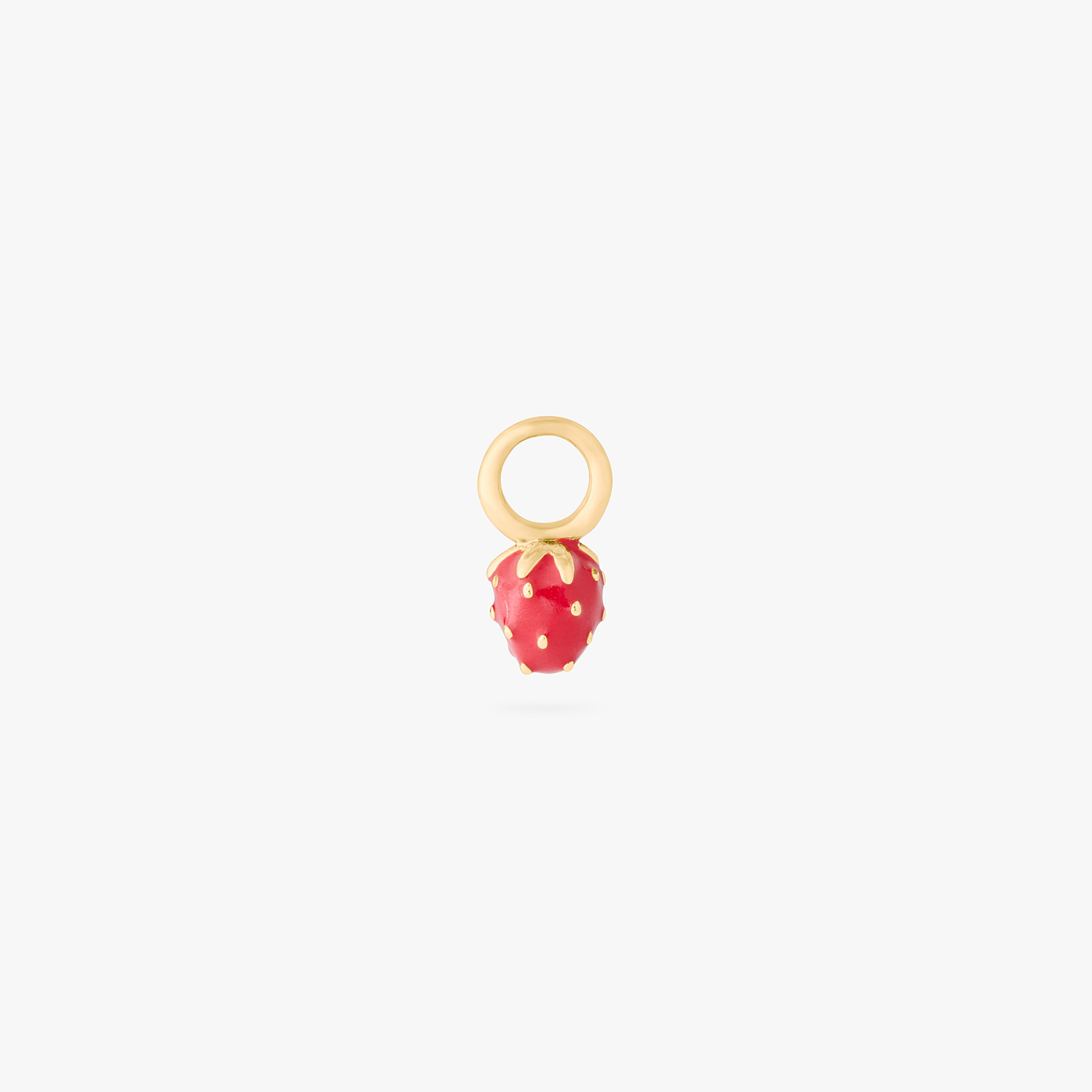 This is an image of a gold earring charm in the shape of a strawberry with red enameling. color:null|gold/red