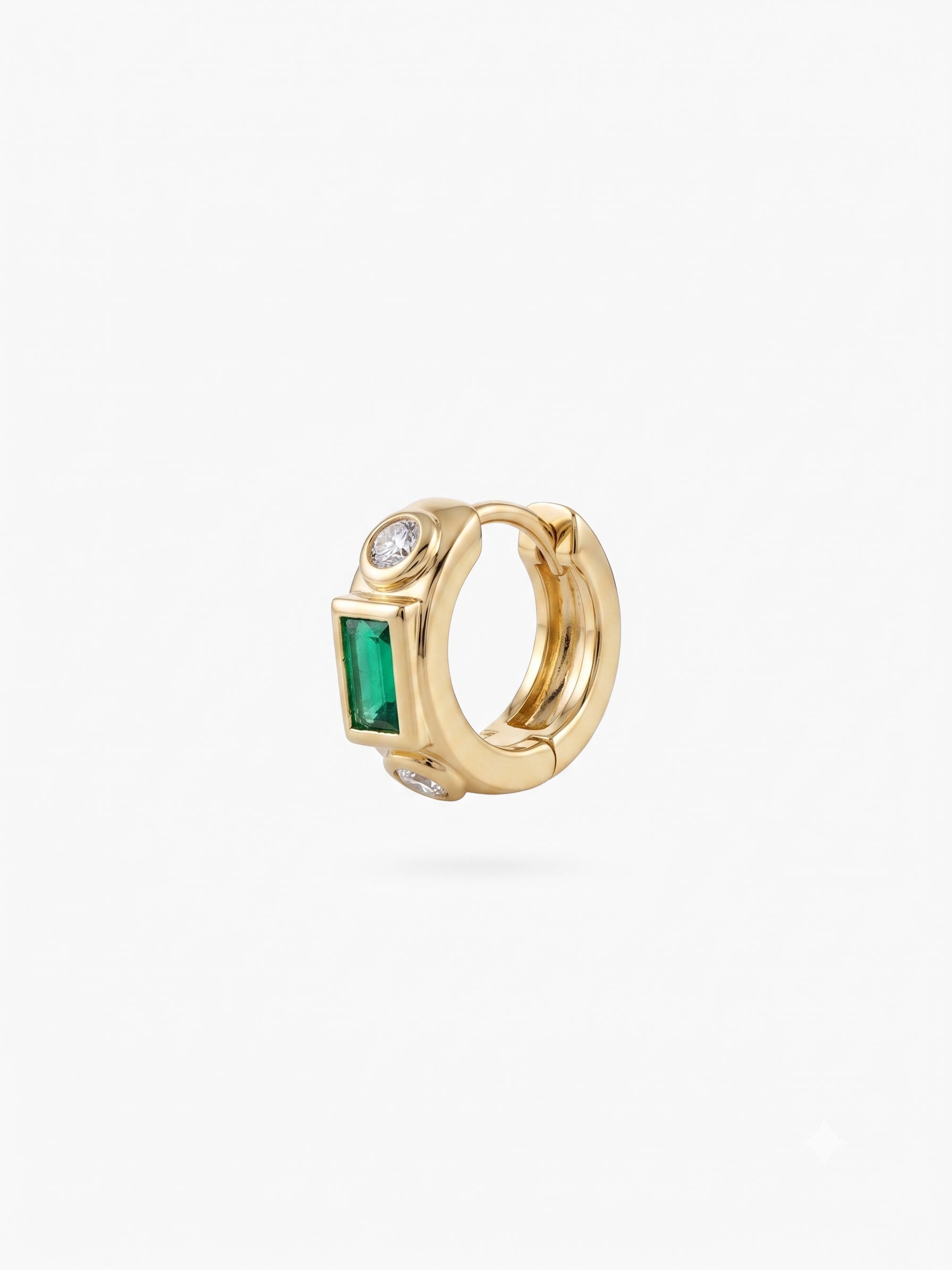 This image shows the front view of a 14k gold plated huggie with three cz stones. One green square in the middle and two clear circular stones on the outside. - Main view