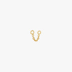 This is an image of a gold toned chain that is 2mm in length with two jump rings at the ends against a white background. 