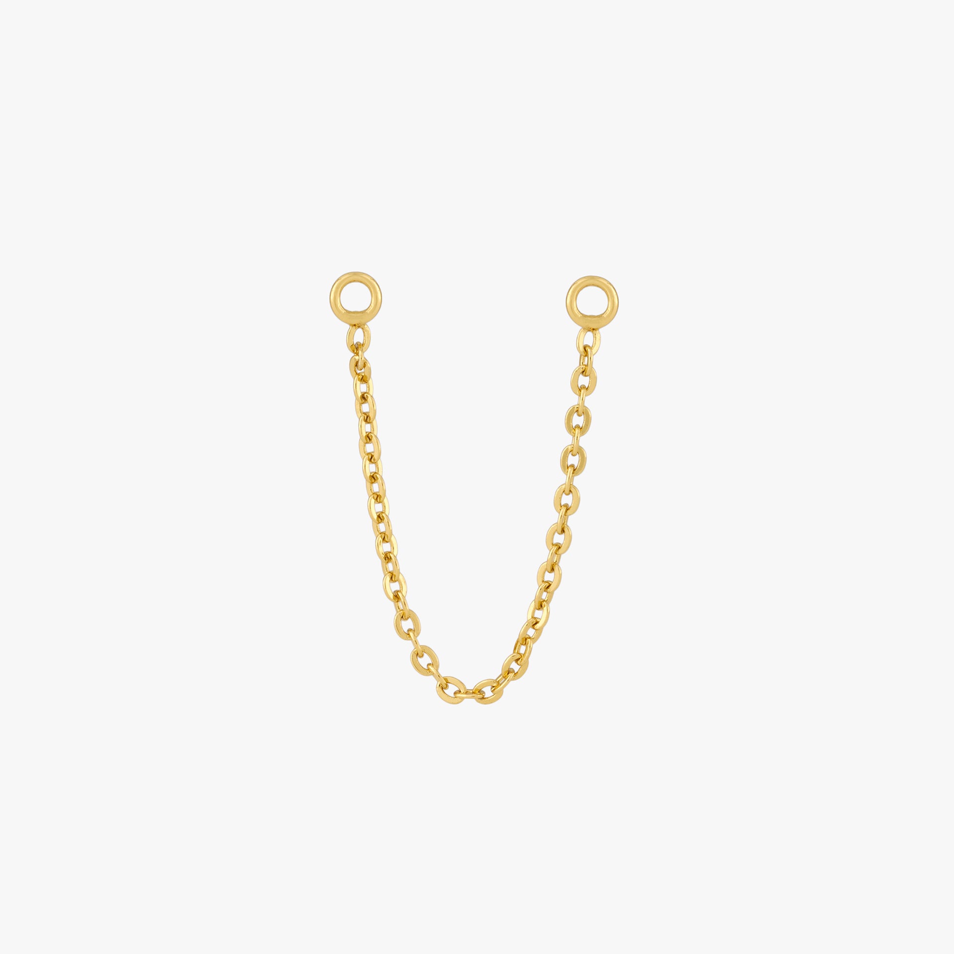 This is an image of a gold toned chain that is 4mm in length with two jump rings at the ends against a white background. - Main view