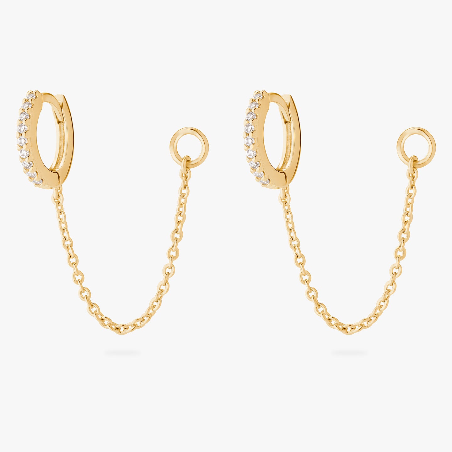 An image of a pair of gold/clear mini pave huggies with connector chains to open 4mm wide jump rings. [pair] color:null|gold/clear