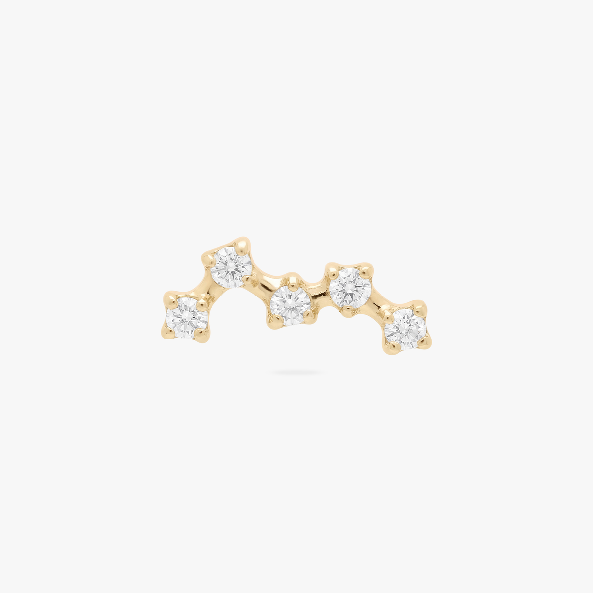 This is an image of a gold toned titanium flatback stud with 5 crystal CZ stones in the shape of a constellation. 