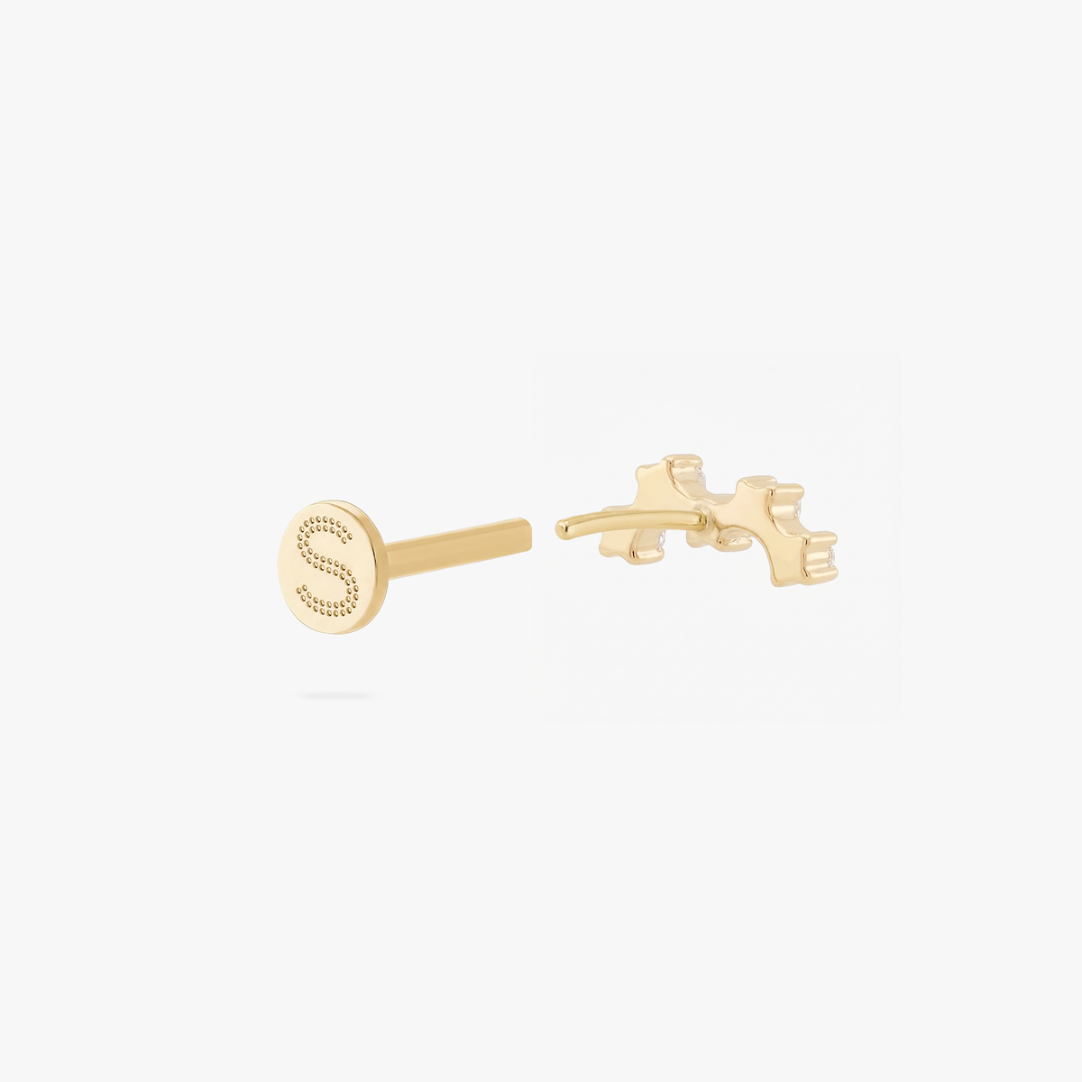 Open back angle of a gold micro cluster flatback stud with an engraved 'S' on the post