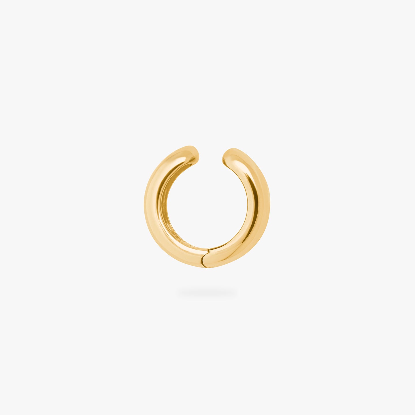 This is a gold, chunky shaped ear cuff. color:null|gold