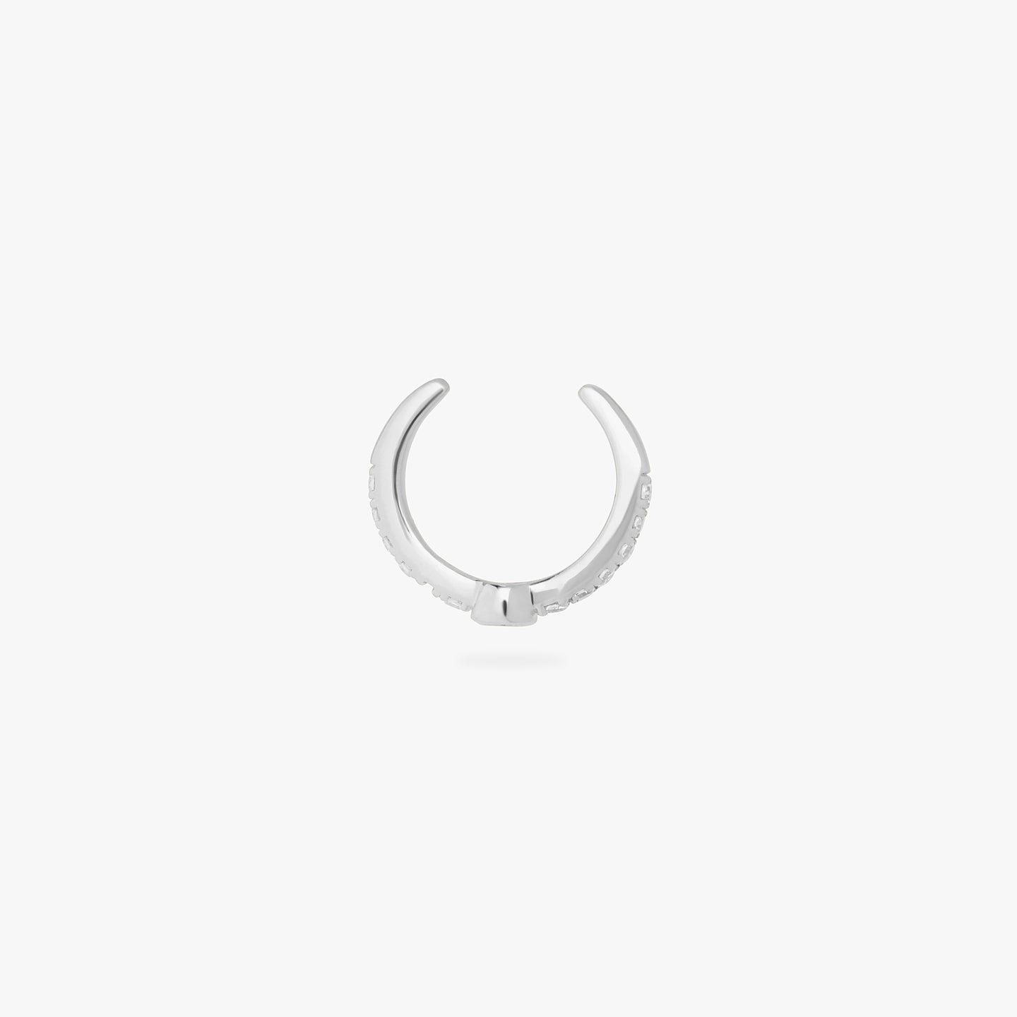 a silver/clear pave slim cuff with a bezel set clear cz stone that a second cz stone dangles from. color:null|silver/clear