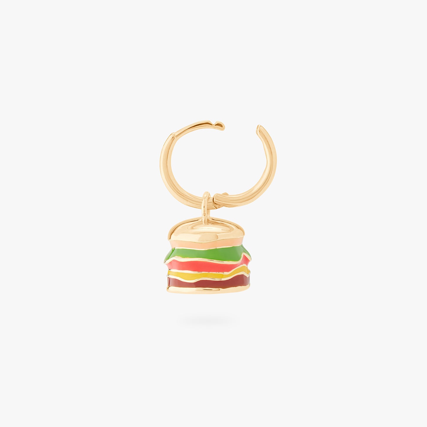 This is an image of a burger-shaped, enameled charm huggie in gold created to look like a Shake Shack Burger unhinged. color:null|gold/clear