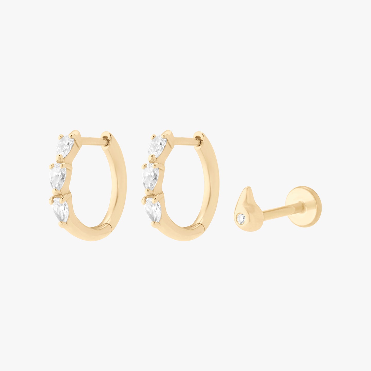 yellow gold set of diamond huggies and a flatback stud color:null|gold/clear