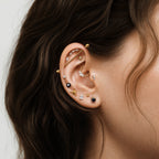 this image shows an earscpae featuring the golden titanium scorpion flatback