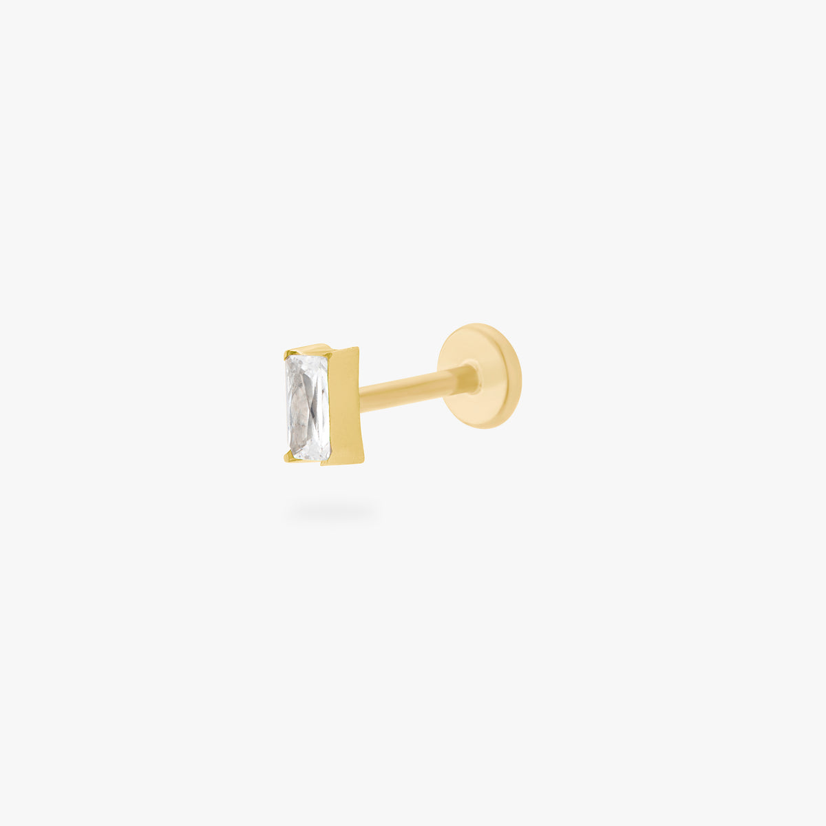 This is an image of a gold toned flatback stud that displays a 5mm, clear baguette cut CZ stone.