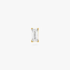 This is an image of a gold toned flatback stud that displays a 5mm, clear baguette cut CZ stone.