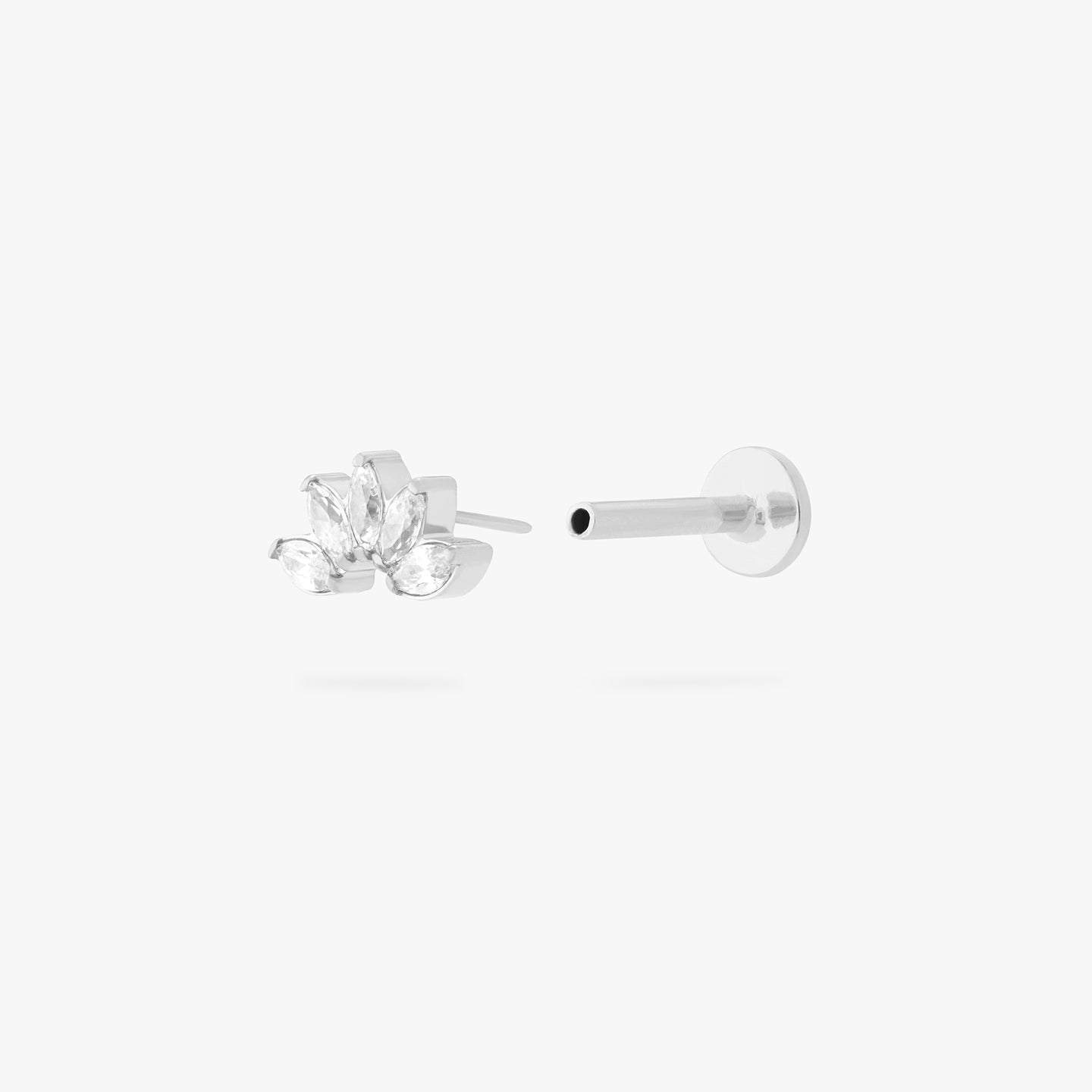 This is an image of a silver/clear crown shaped flatback top that has 5 marquise shaped CZs, with a silver labret that has a circle disc engraved with the 