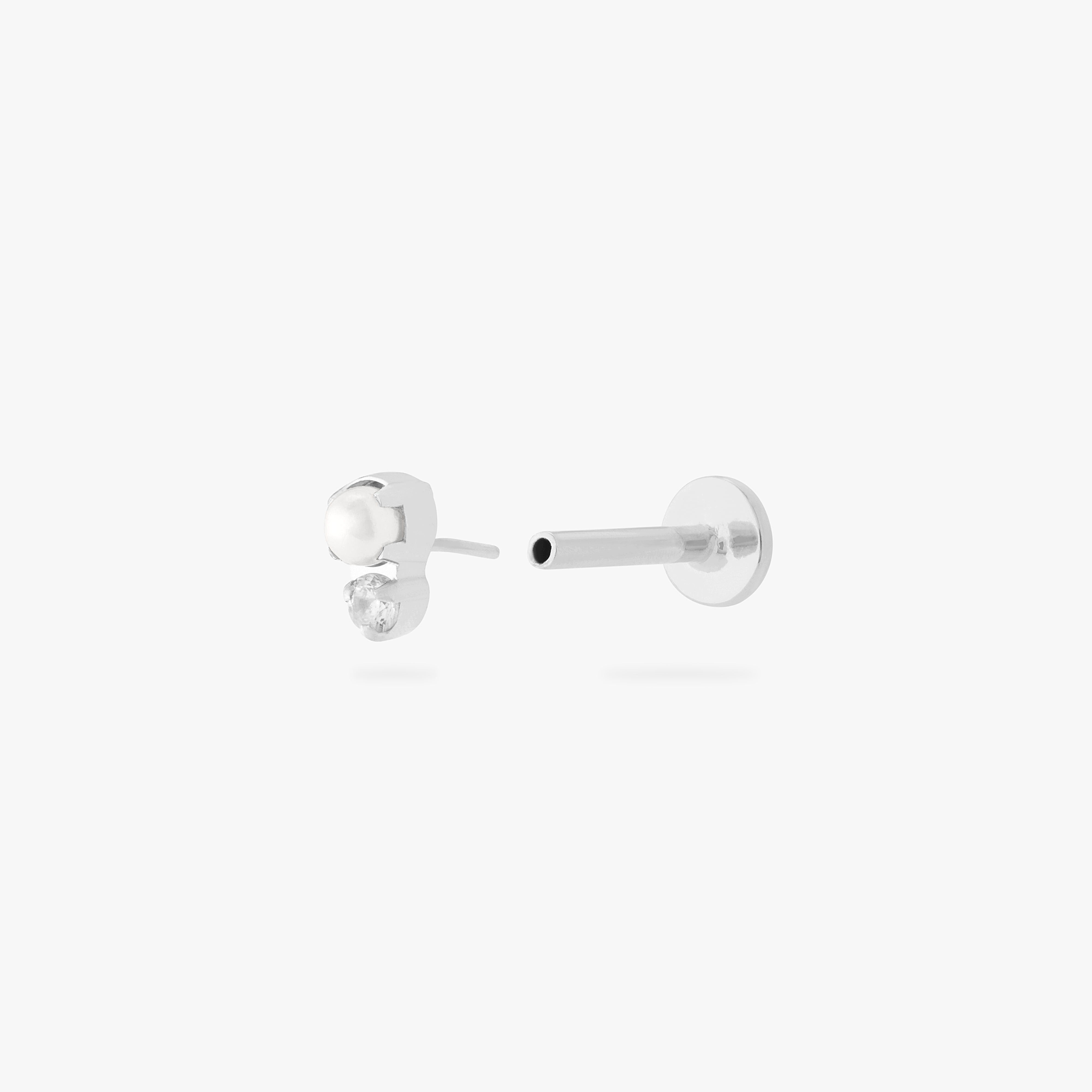 This is an image of a flatback top which has a pearl stacked over silver/clear CZ and then a silver labret that has a circle disc with the "S" logo engraved on it. color:null|silver/clear