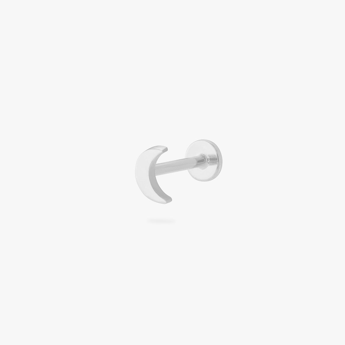 This is an image of a silver moon shaped flatback top with a silver labret with a circle disc with the "S" logo engraved in it. color:null|silver/clear|silver