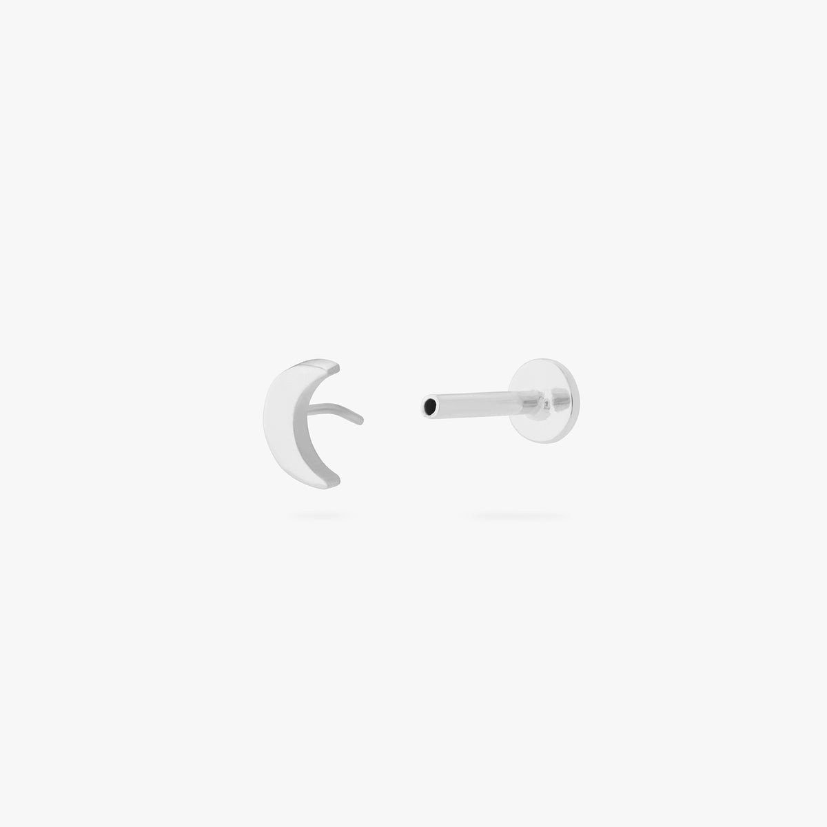 This is an image of a silver moon shaped flatback top with a silver labret with a circle disc with the "S" logo engraved in it. color:null|silver/clear|silver