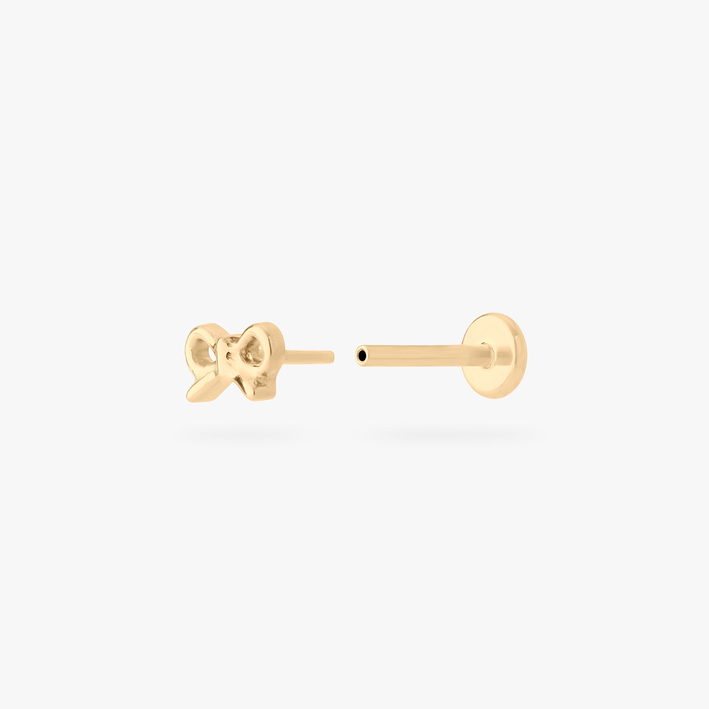 micro bow flatback stud in gold color:null|gold