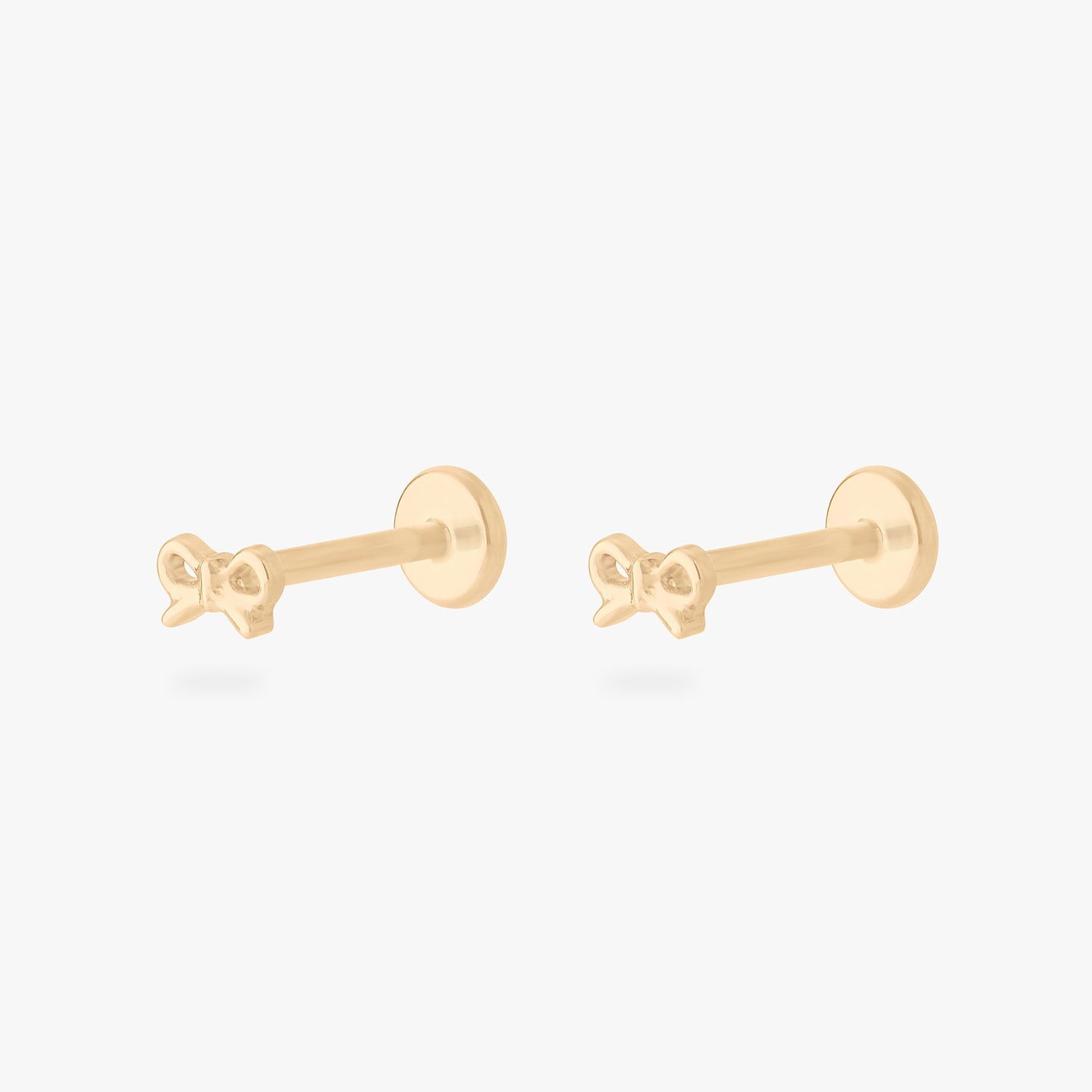 micro bow flatback stud in gold [pair] color:null|gold