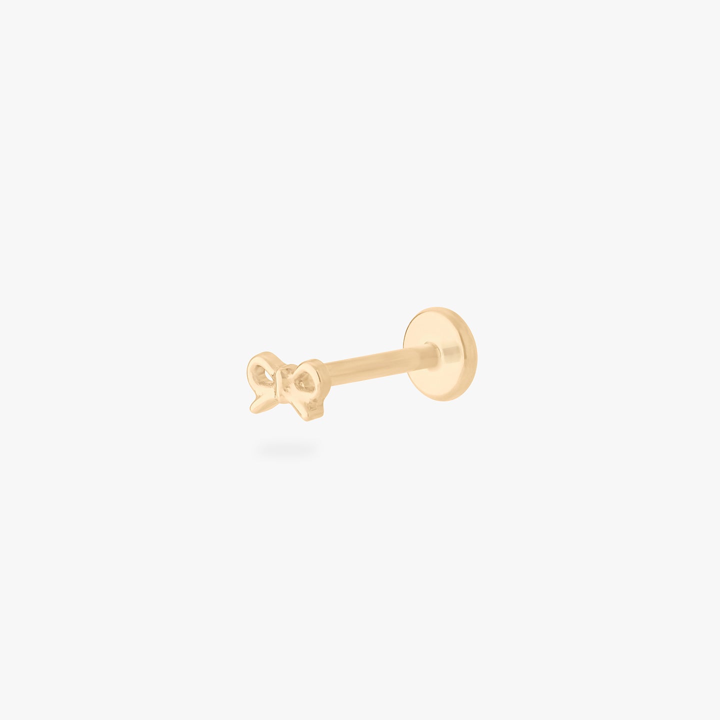 micro bow flatback stud in gold color:null|gold