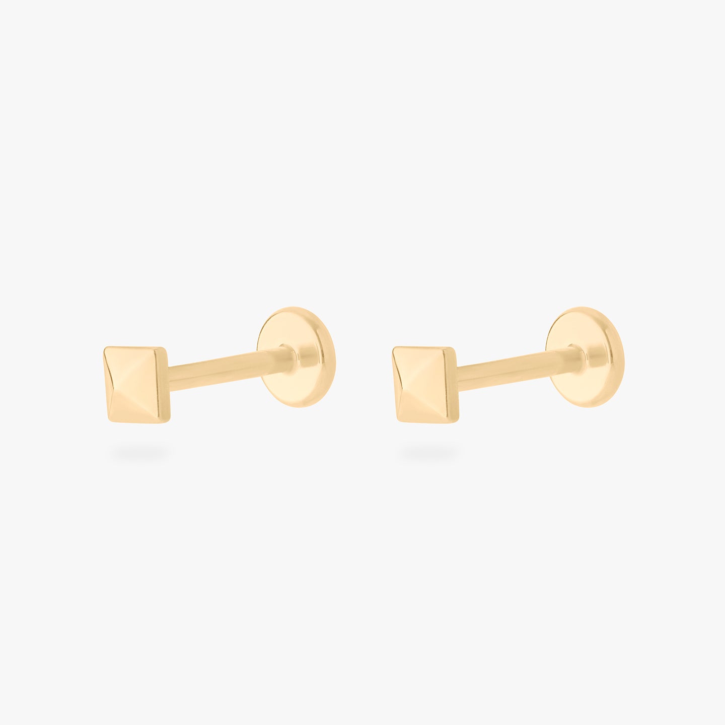 gold pyramid flatback stud [pair] color:null|gold