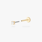 This is an image of a 14K yellow gold PVD plated titanium flatback stud with a clear CZ stone.