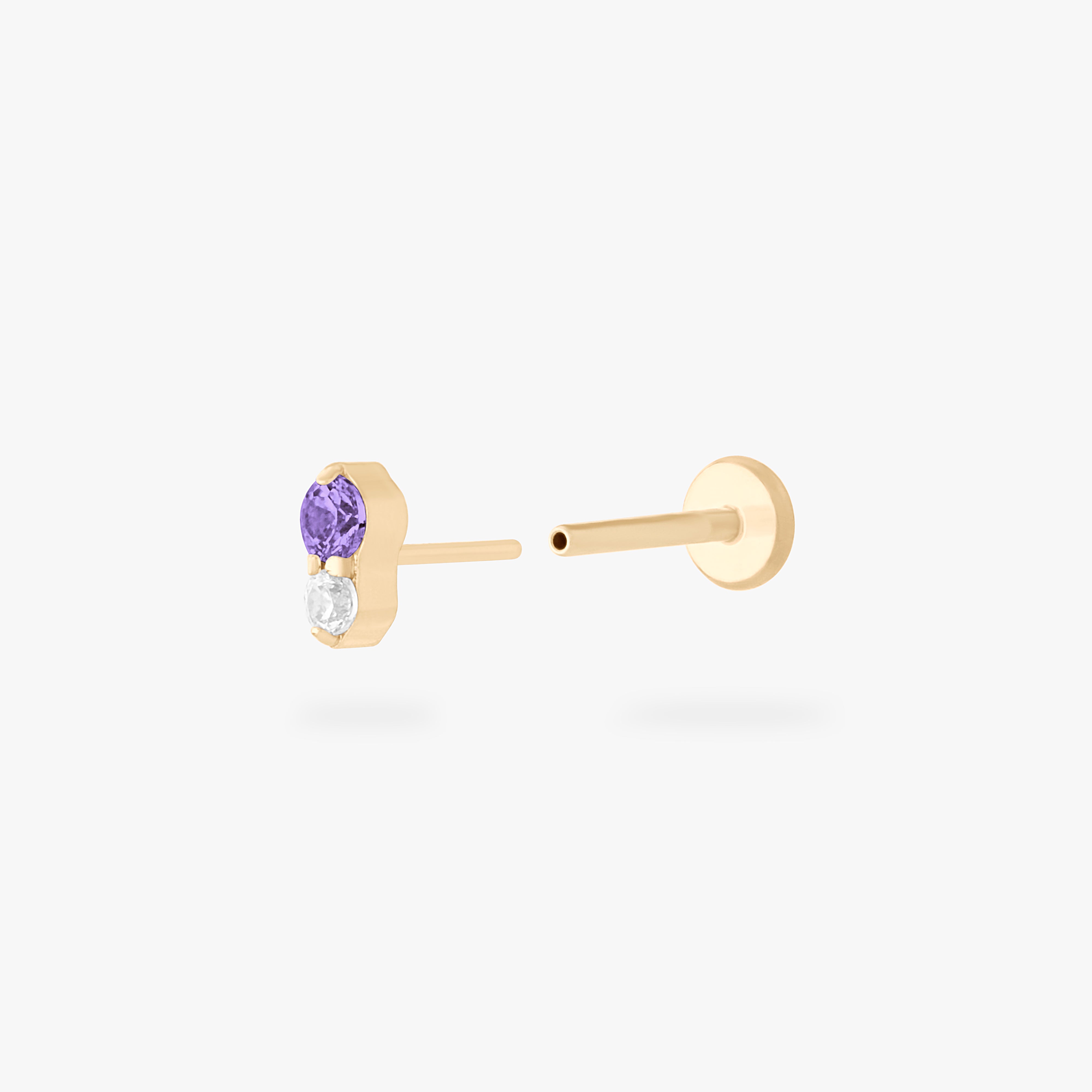 This is a gold flatback stud with an amethyst cz stacked over a clear cz. color:null|amethyst