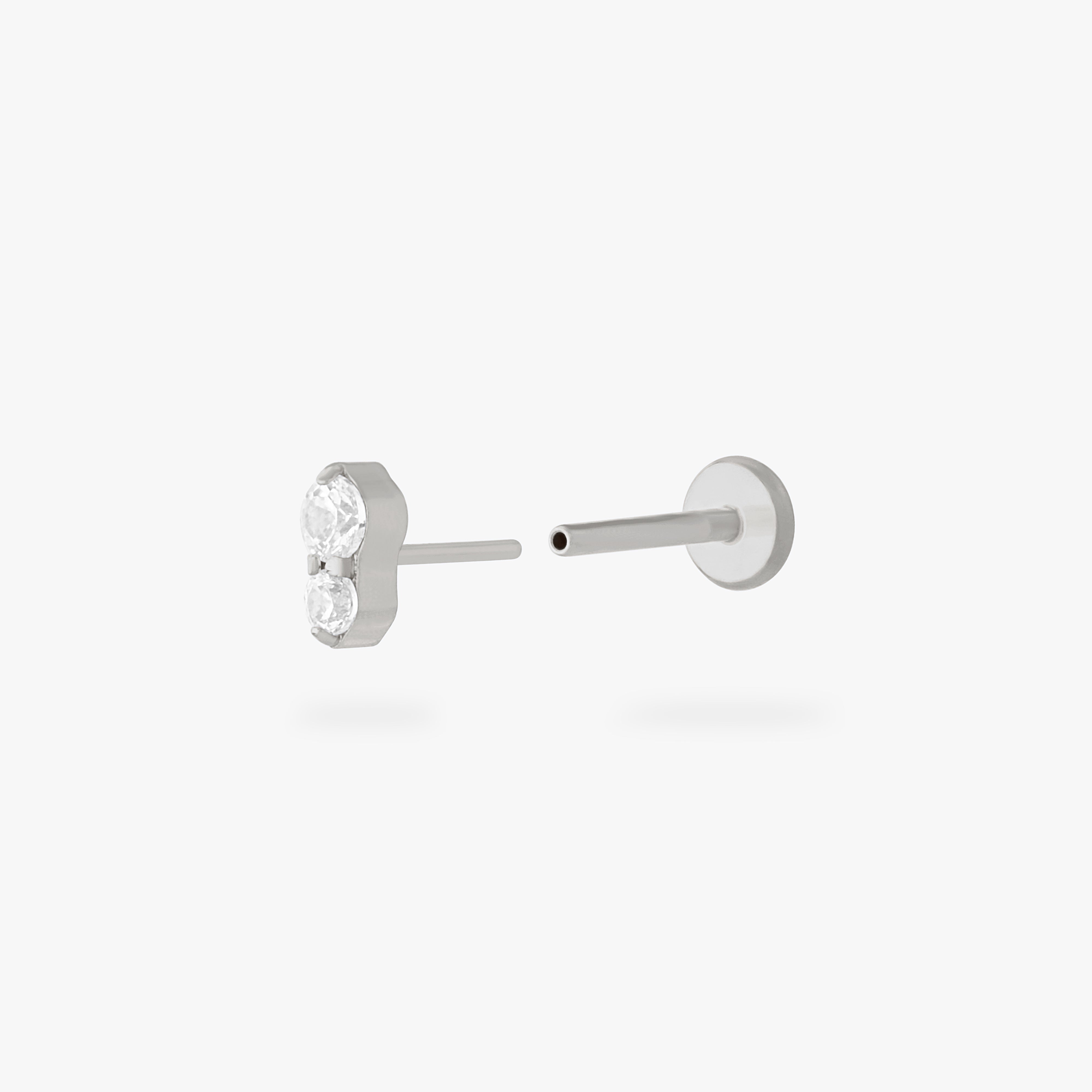 This is an image of a silver flatback stud composed of titanium with a clear cz stone stacked over a clear cz stone. color:null|silver/clear