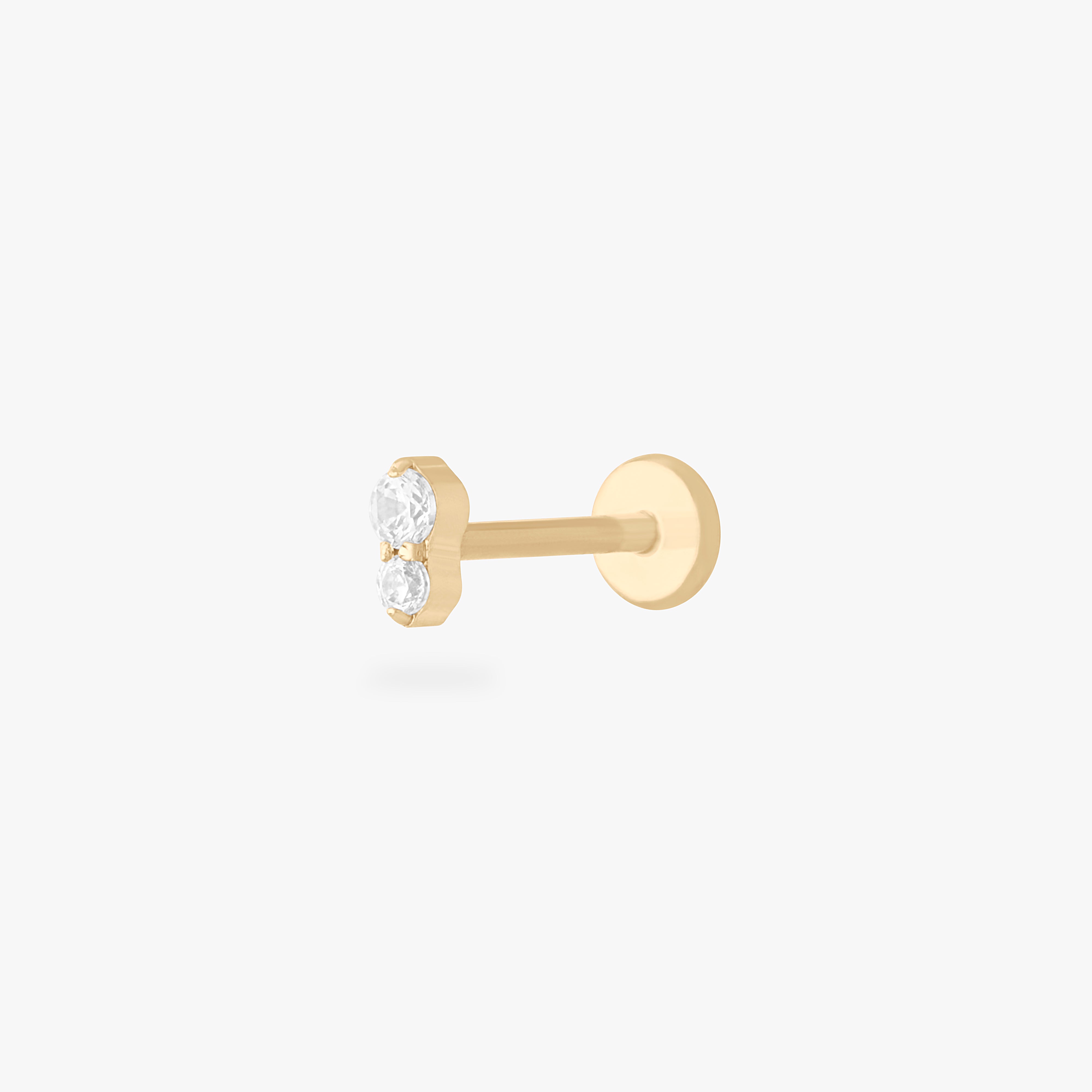 This is a gold flatback stud with a crystal cz stacked over a clear cz. color:null|crystal