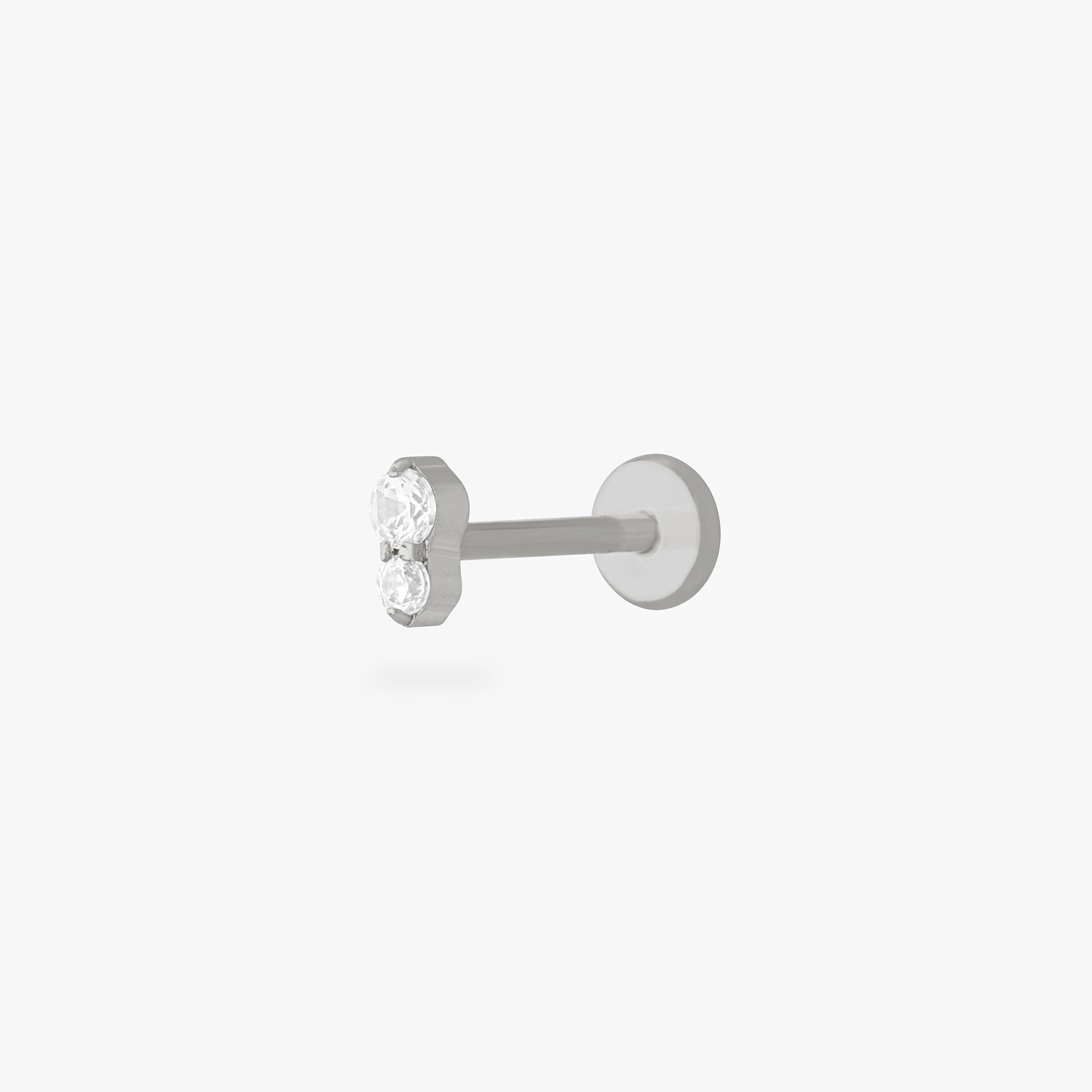 This is an image of a silver flatback stud composed of titanium with a clear cz stone stacked over a clear cz stone. color:null|silver/clear