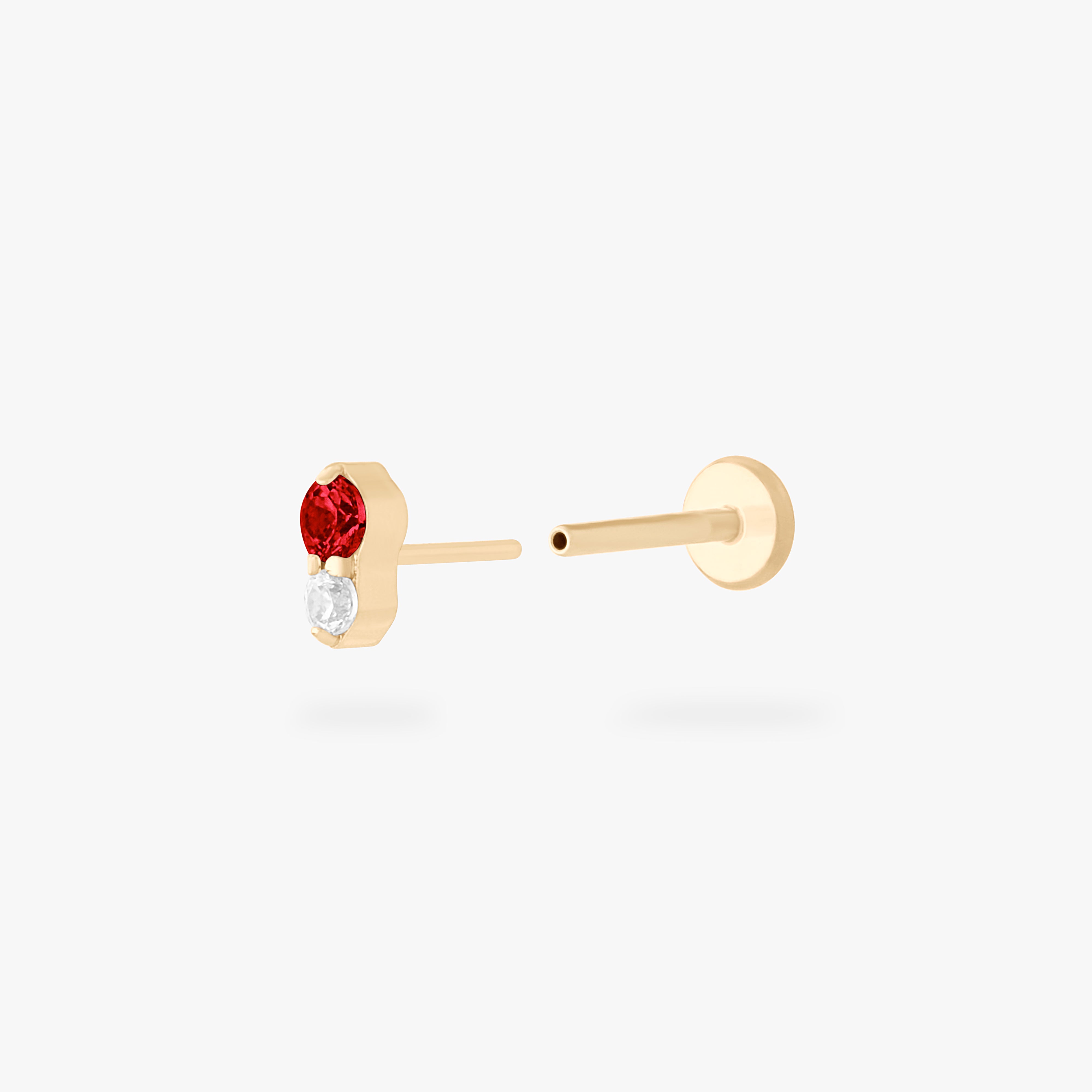 This is a gold flatback stud with a garnet cz stacked over a clear cz. color:null|garnet