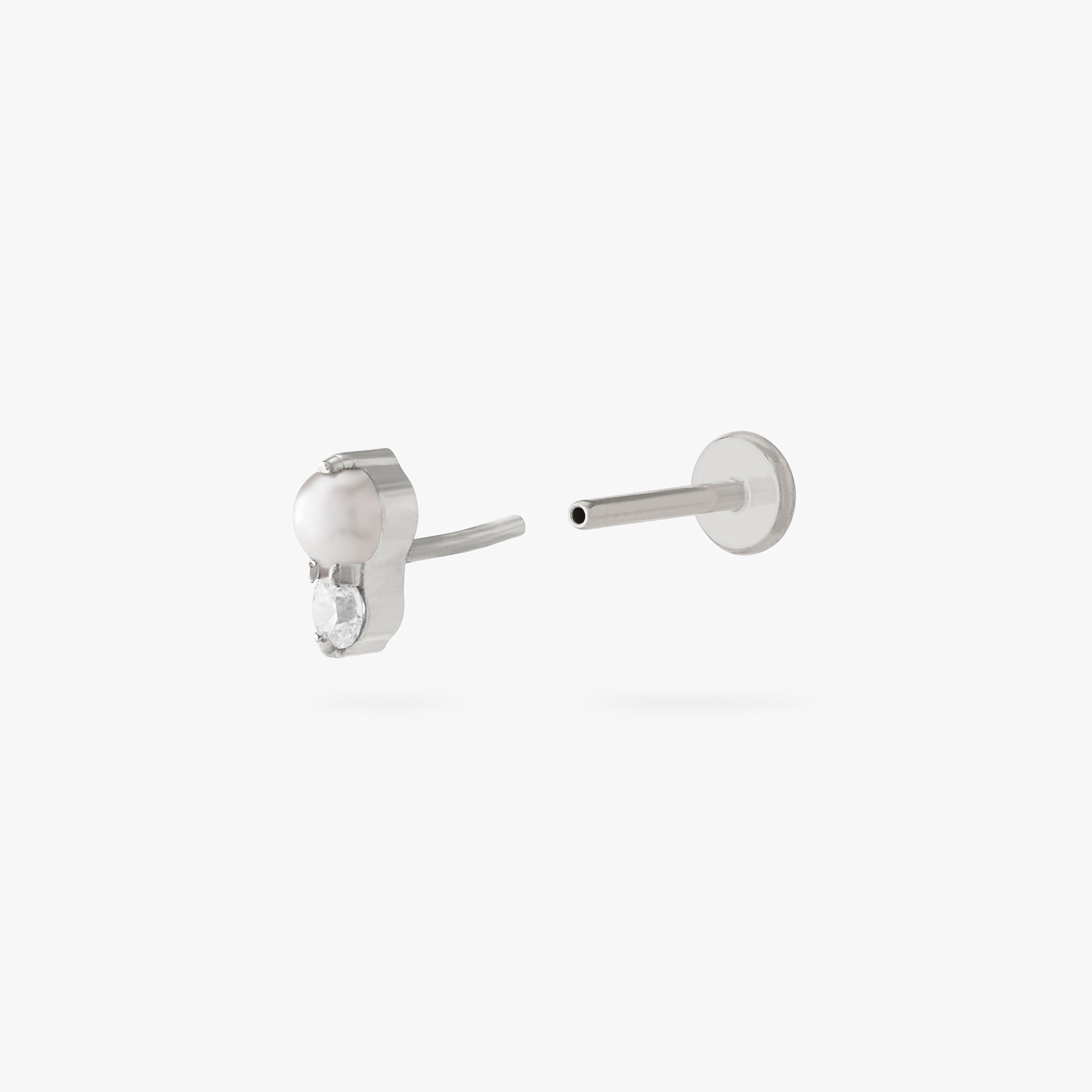 This is an image of a silver flatback stud composed of titanium with a pearl stone stacked over a clear cz stone. color:null|silver/pearl