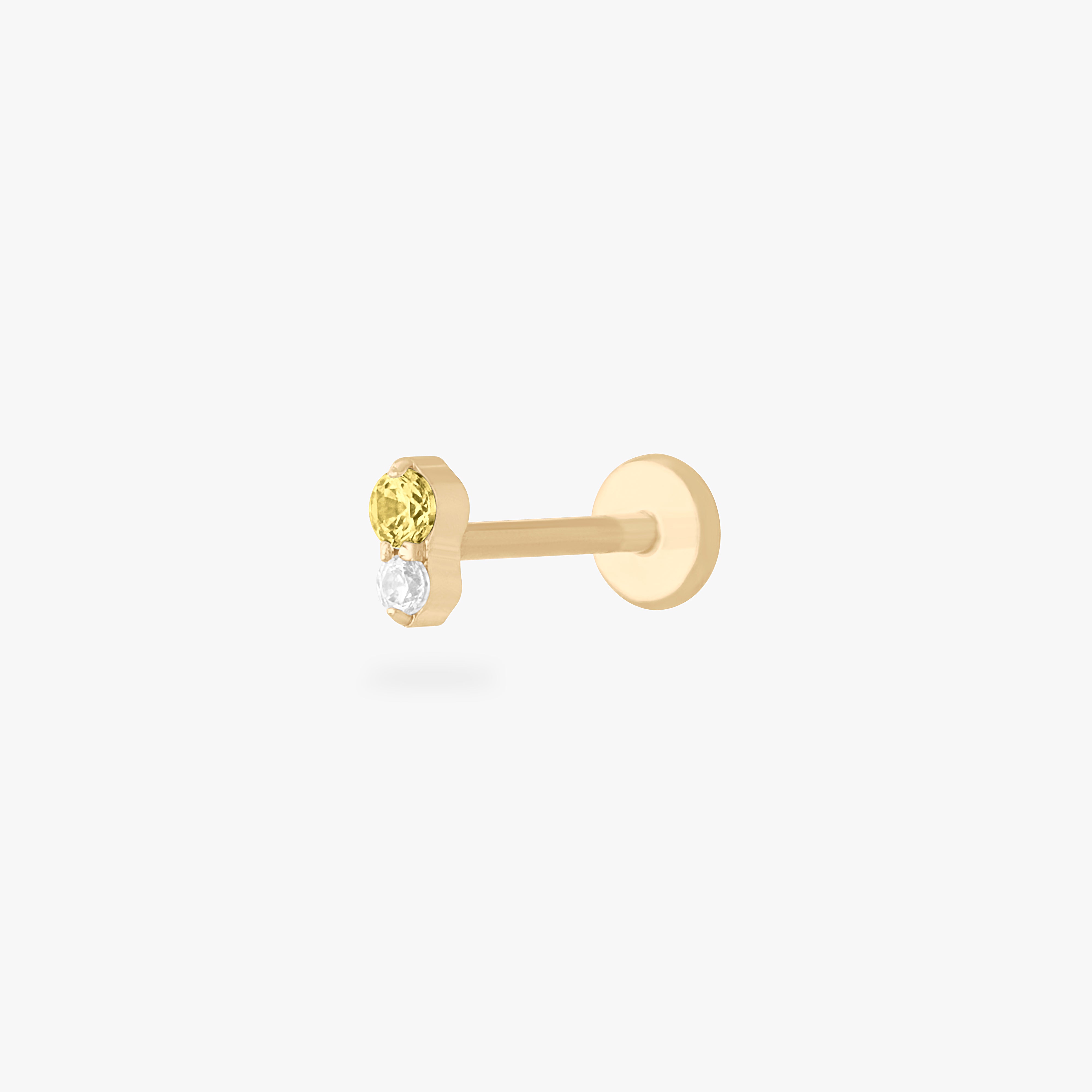 This is a gold flatback stud with a topaz cz stacked over a clear cz. color:null|topaz