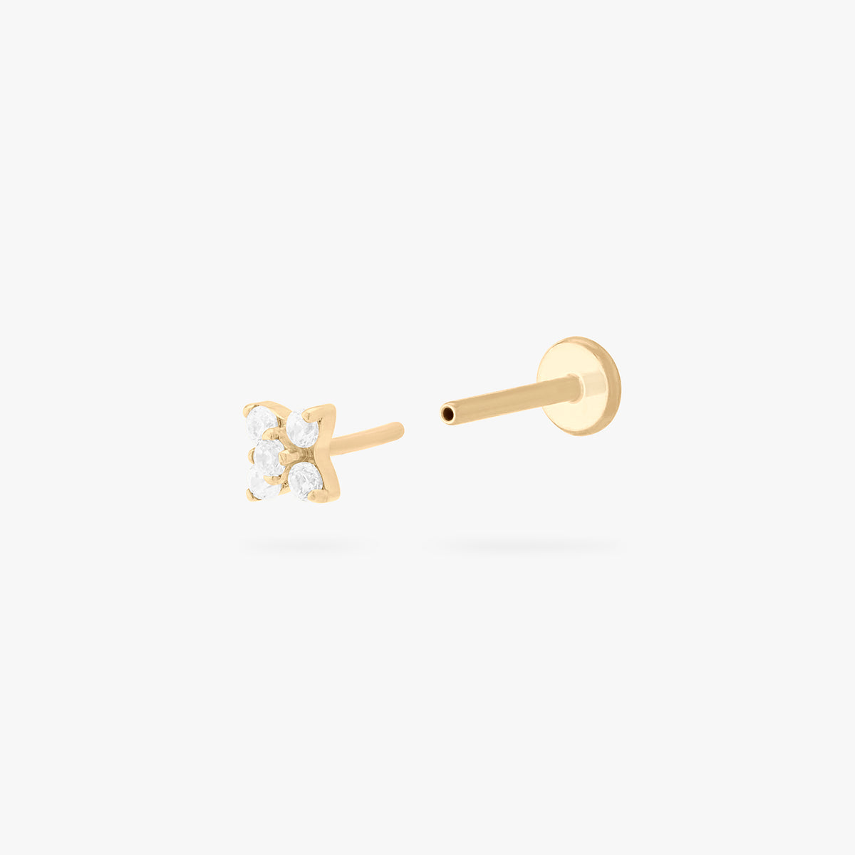 This is an image of a gold-toned flatback stud that has pave cz stones in the shape of an X. color:null|gold/clear