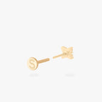 This is an image of a gold-toned flatback stud that has pave cz stones in the shape of an X. color:null|gold/clear