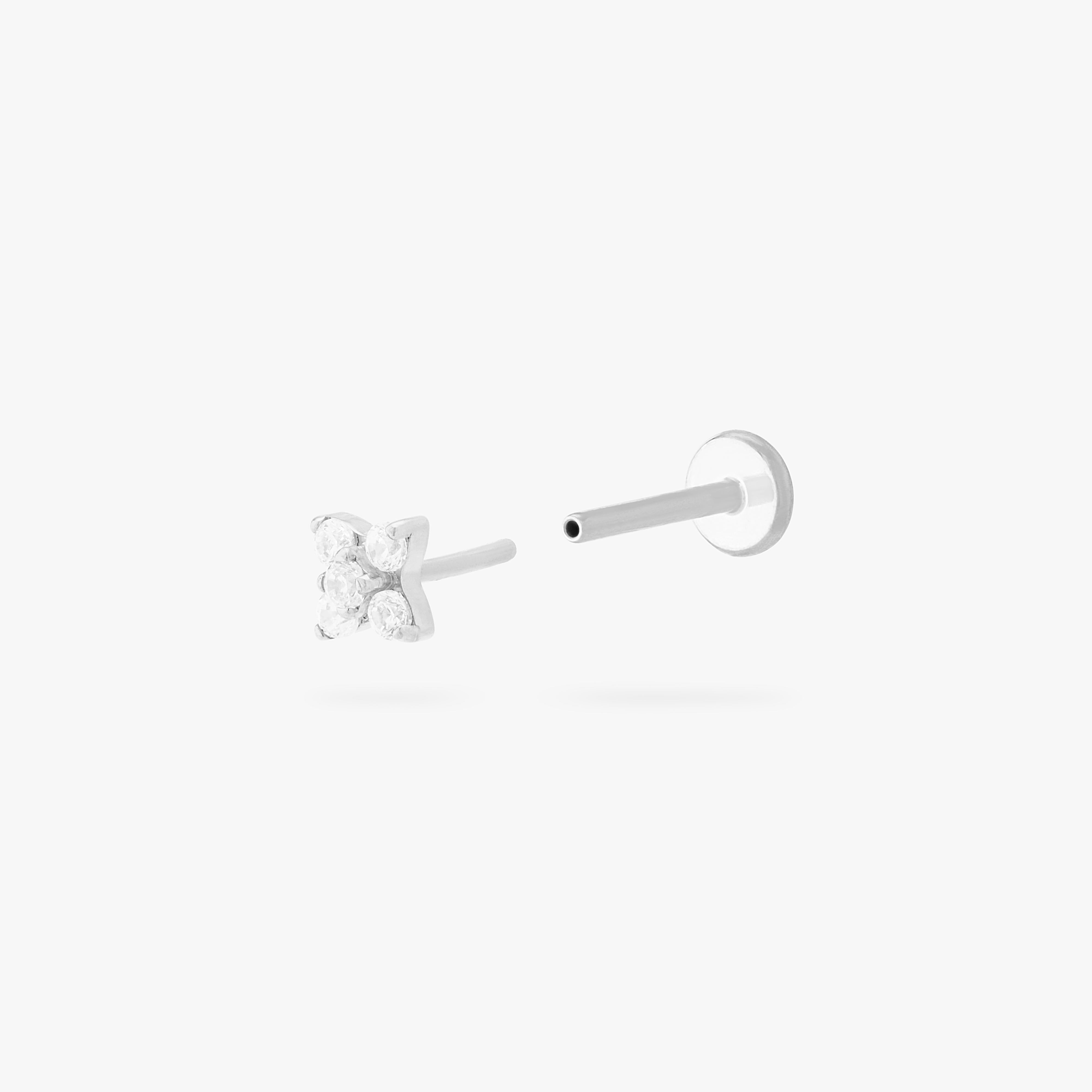 This is an image of a silver-toned flatback stud that has pave cz stones in the shape of an X. color:null|silver/clear