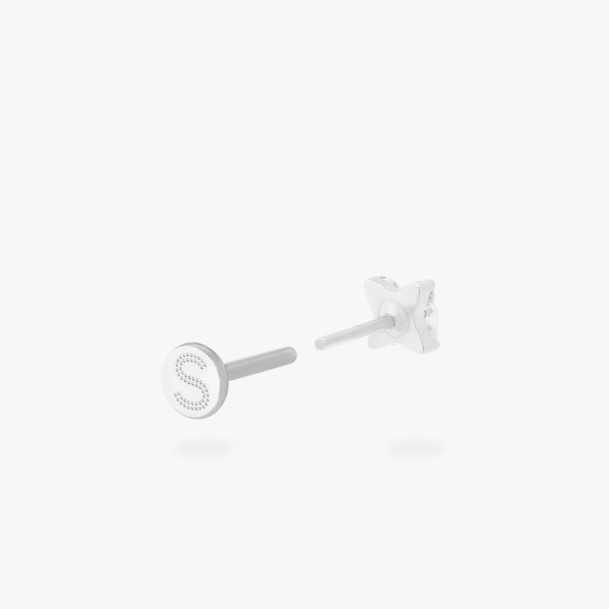 This is an image of a silver-toned flatback stud that has pave cz stones in the shape of an X. color:null|silver/clear