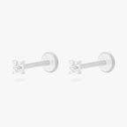 This is an image of a pair of silver-toned flatback studs that have pave cz stones in the shape of an X. [pair] color:null|silver/clear