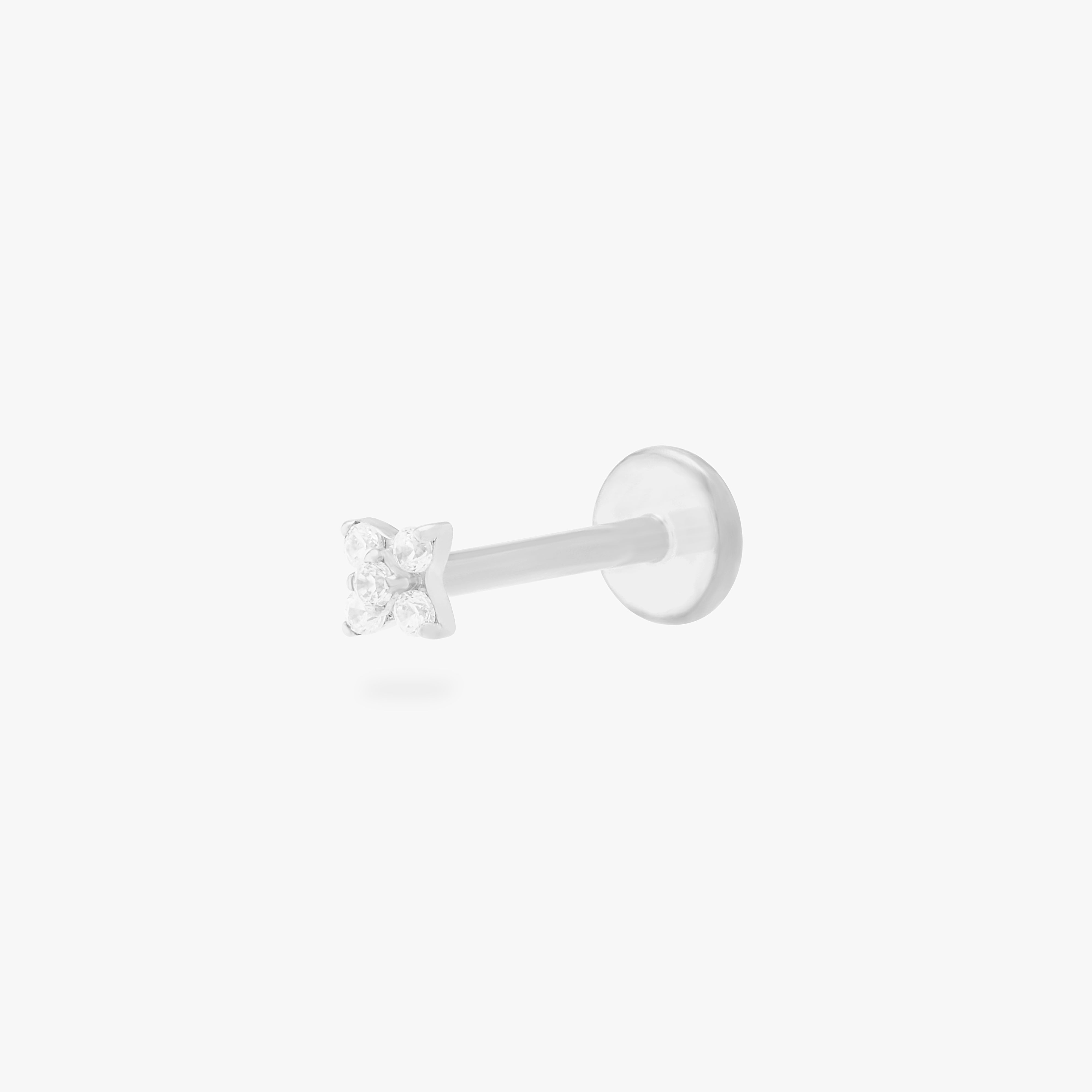 This is an image of a silver-toned flatback stud that has pave cz stones in the shape of an X. color:null|silver/clear