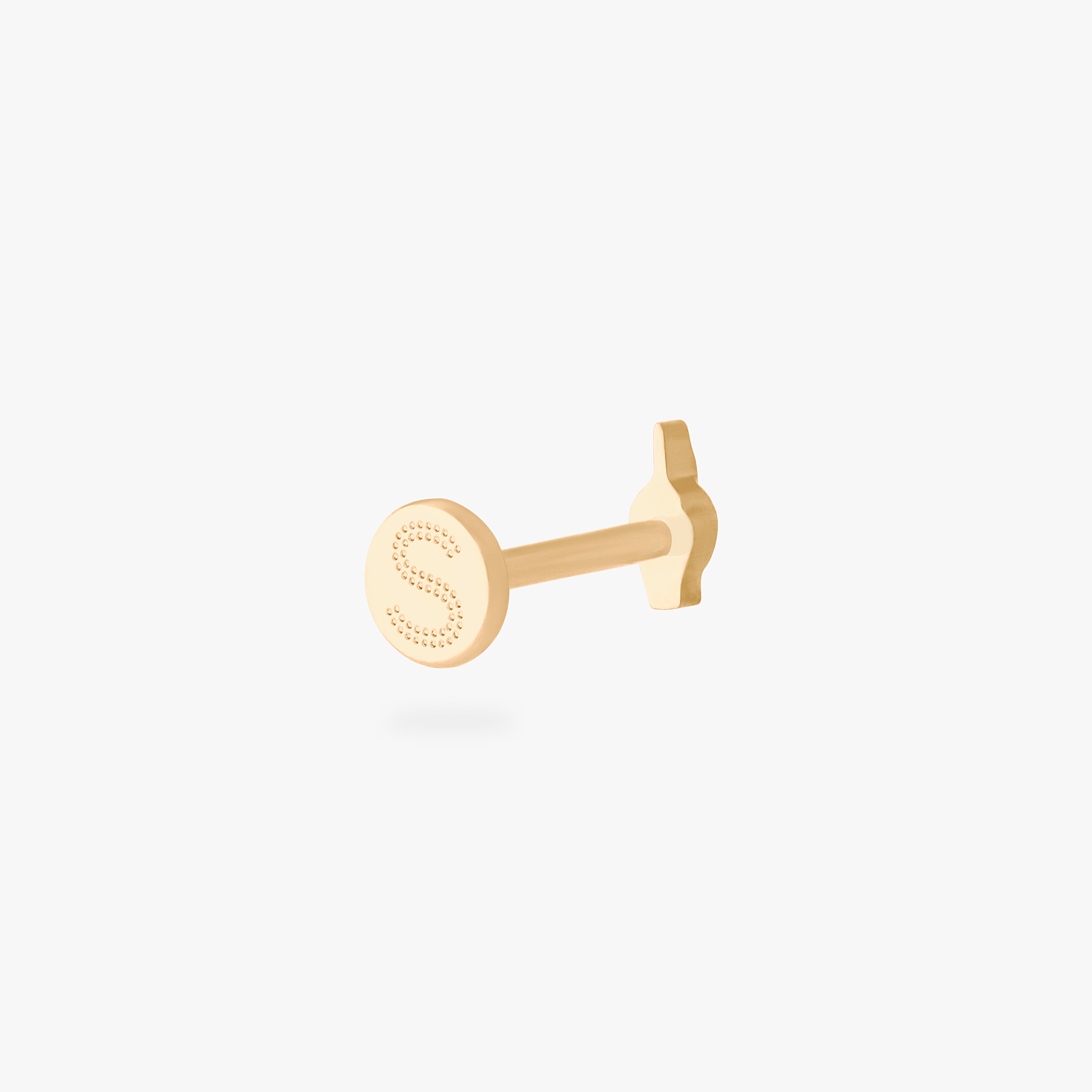 This is an image of a gold-toned flatback stud that is in the shape of a middle finger. color:null|gold