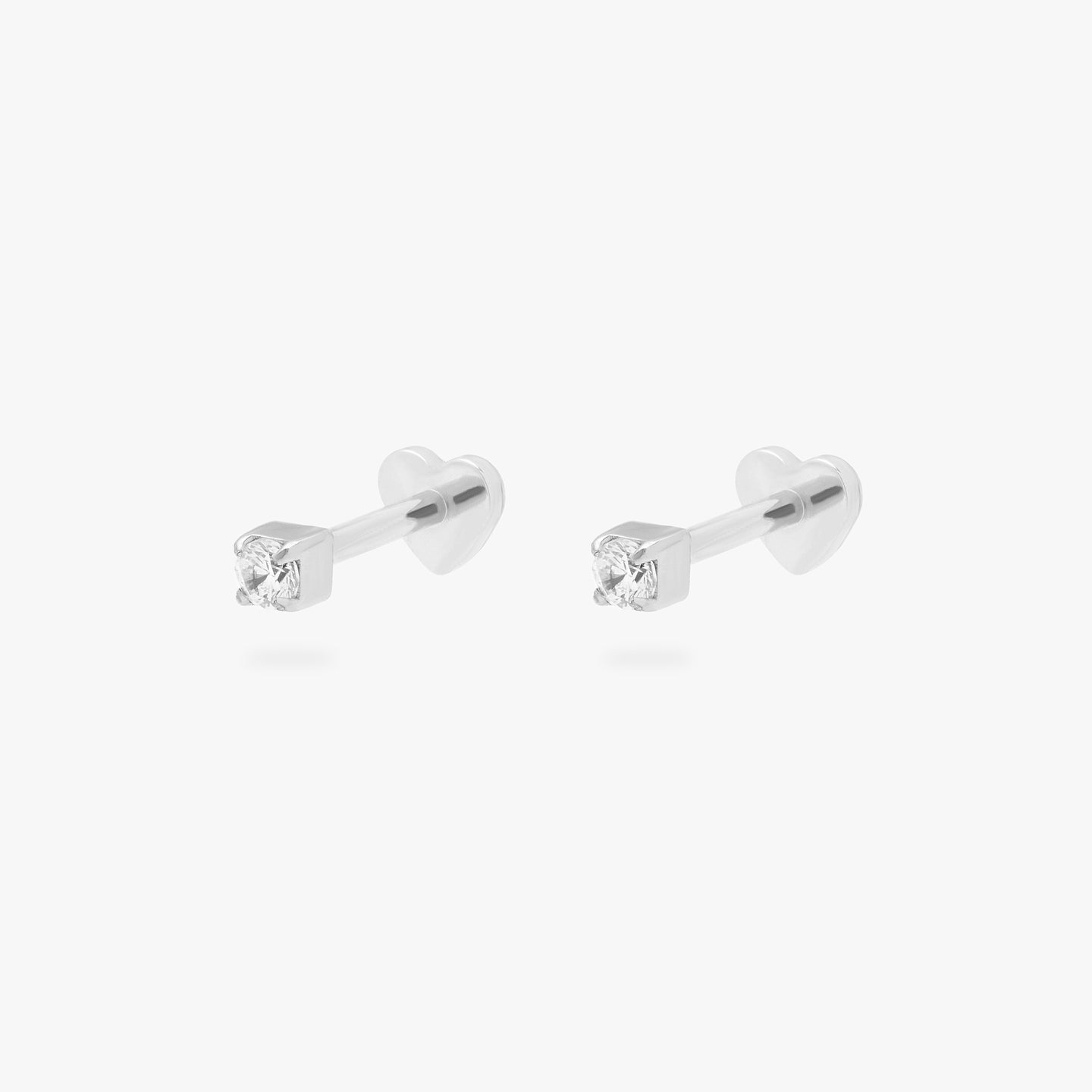 This is an image of a silver/clear mini CZ flatback top with a heart flatback post. [pair] color:null|silver/clear