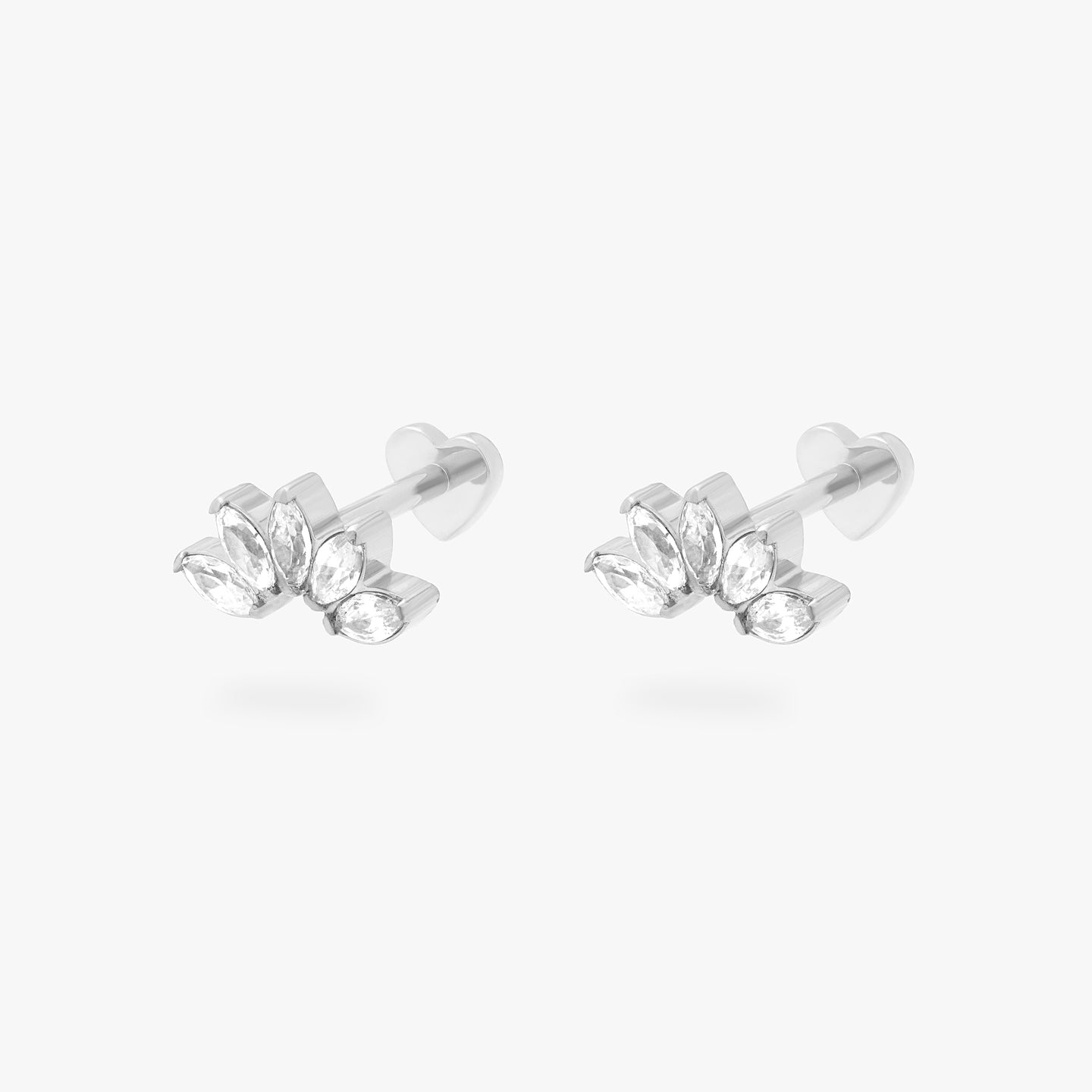 This is an image of a pair of silver/clear crown shaped flatback tops that have 5 marquise shaped CZs and heart-shaped silver flatback posts. [pair] color:null|silver/clear