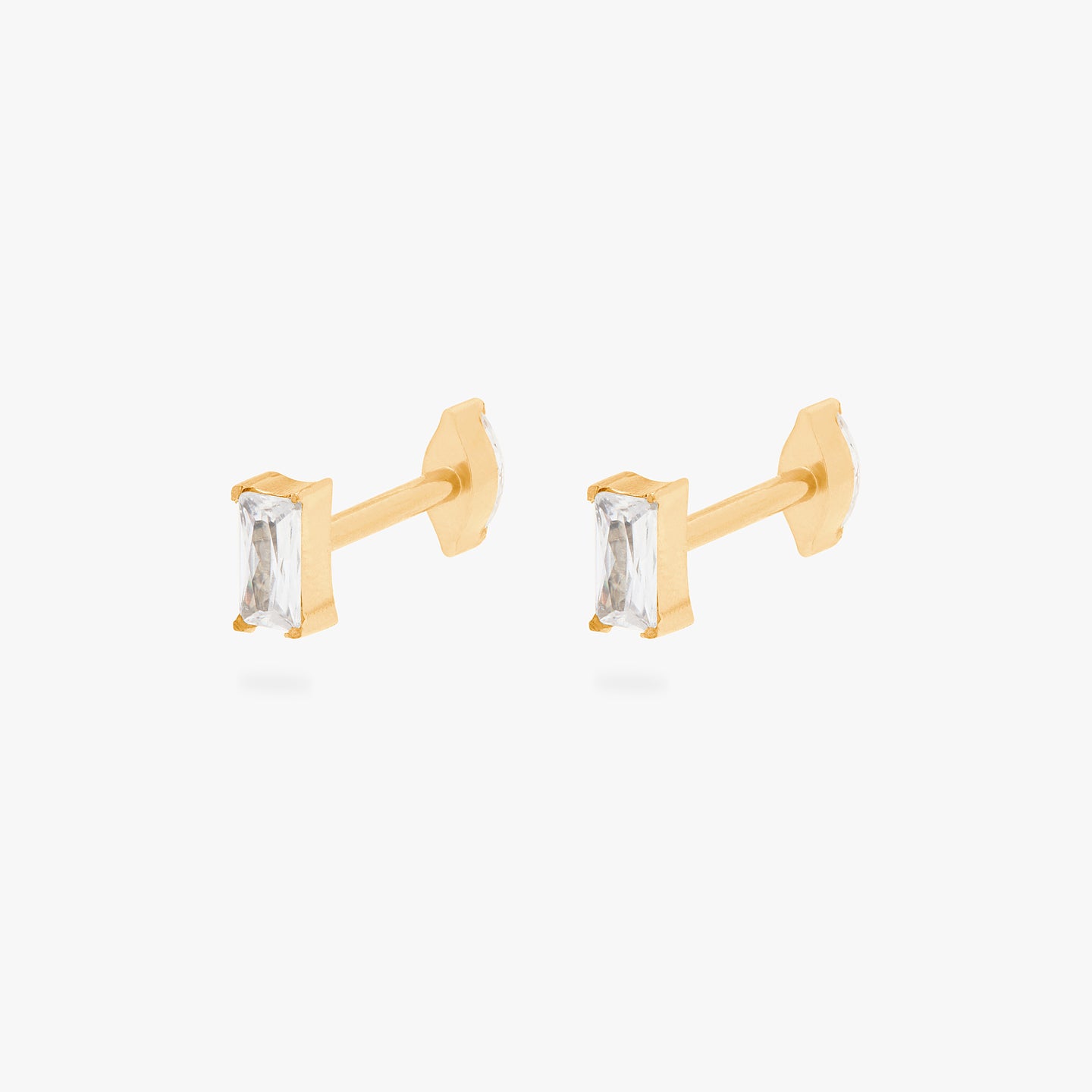 This is an image of a pair of gold/clear baguette shaped CZ flatback tops with gold/clear marquise shaped CZ flatback posts. [pair] color:null|gold/clear
