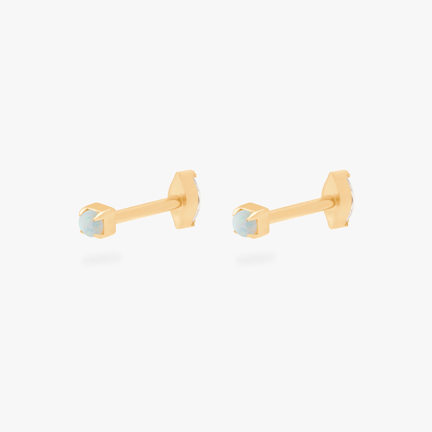 This is an image of a gold/opal flatback top with a gold/clear flatback post that has a marquise-shaped CZ. [pair] color:null|gold/opal