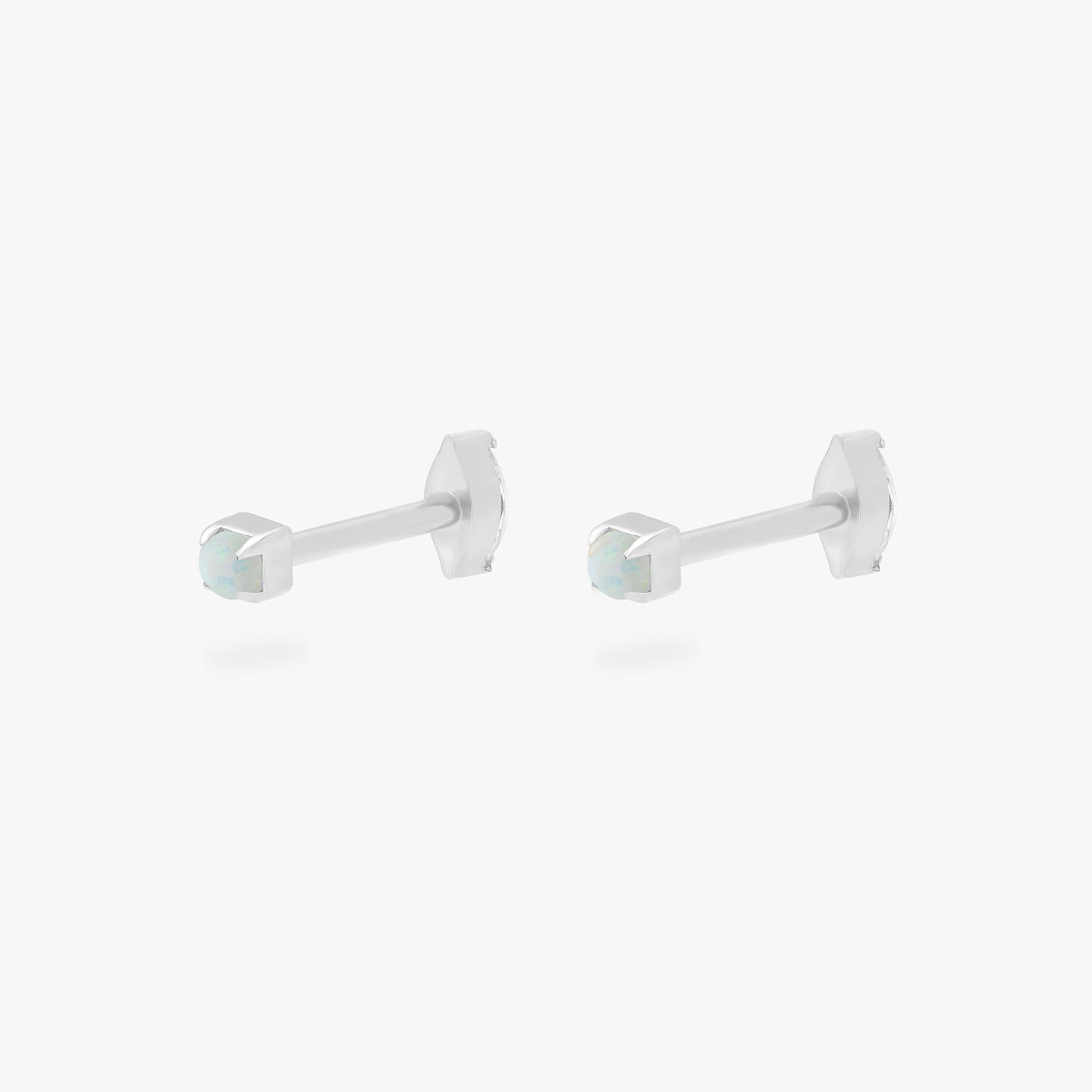 This is an image of a silver/opal flatback top with a silver/clear flatback post that has a marquise-shaped CZ. [pair] color:null|silver/opal