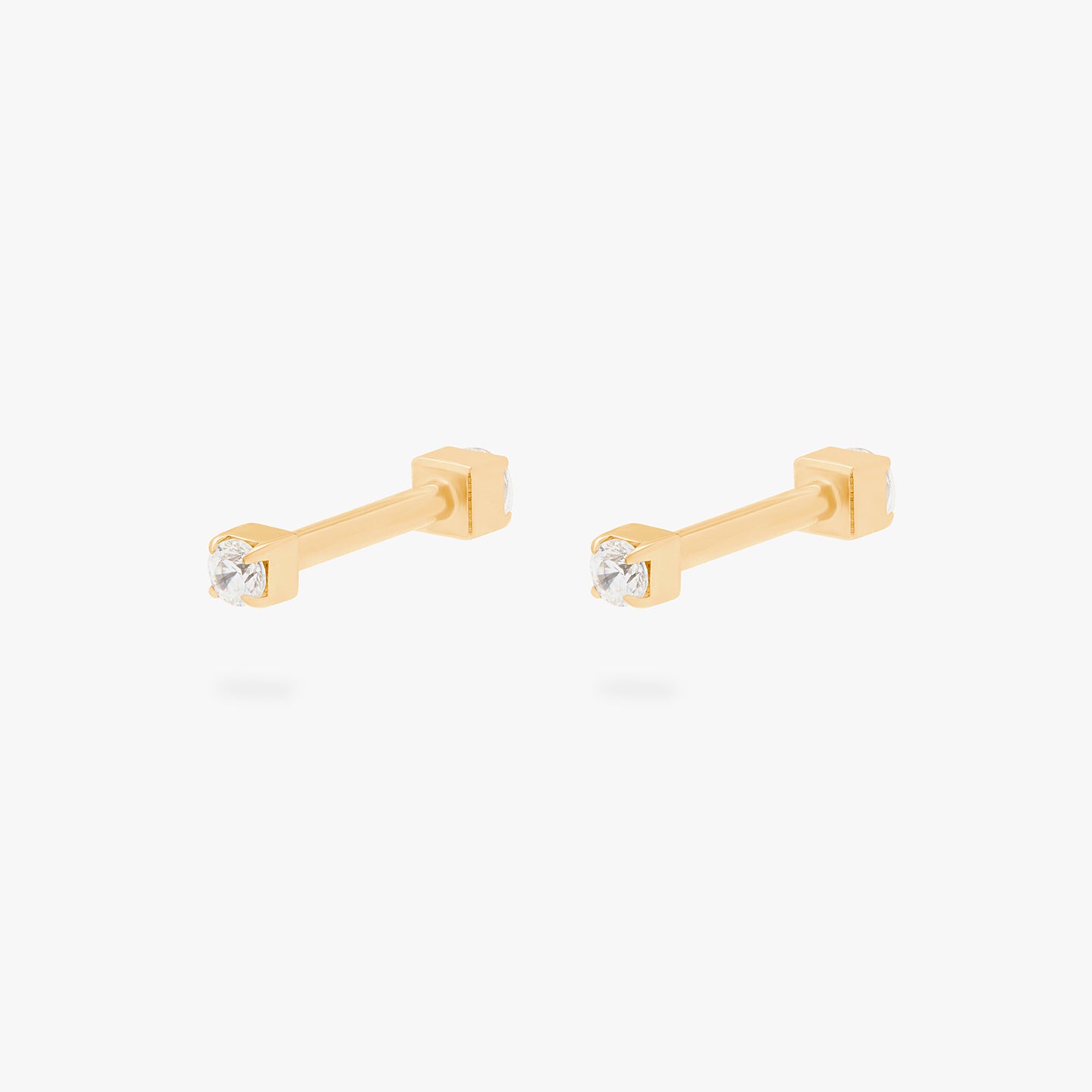 This is an image of a gold/clear mini CZ flatback top with a gold/clear CZ flatback post. [pair] color:null|gold/clear